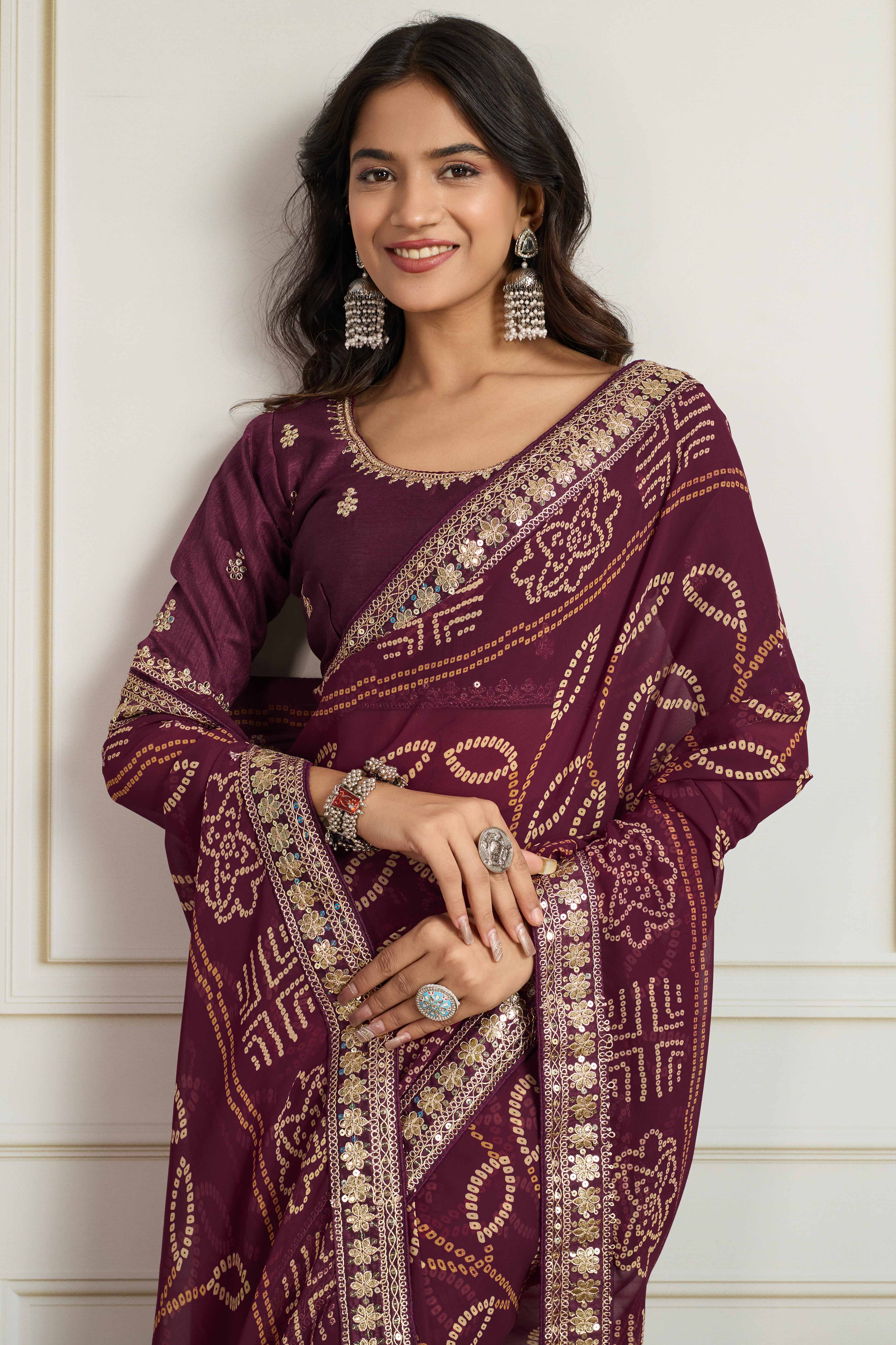 Wine Bandhani Digital Printed Georgette Saree Enhanced With Cording Embroidered Border