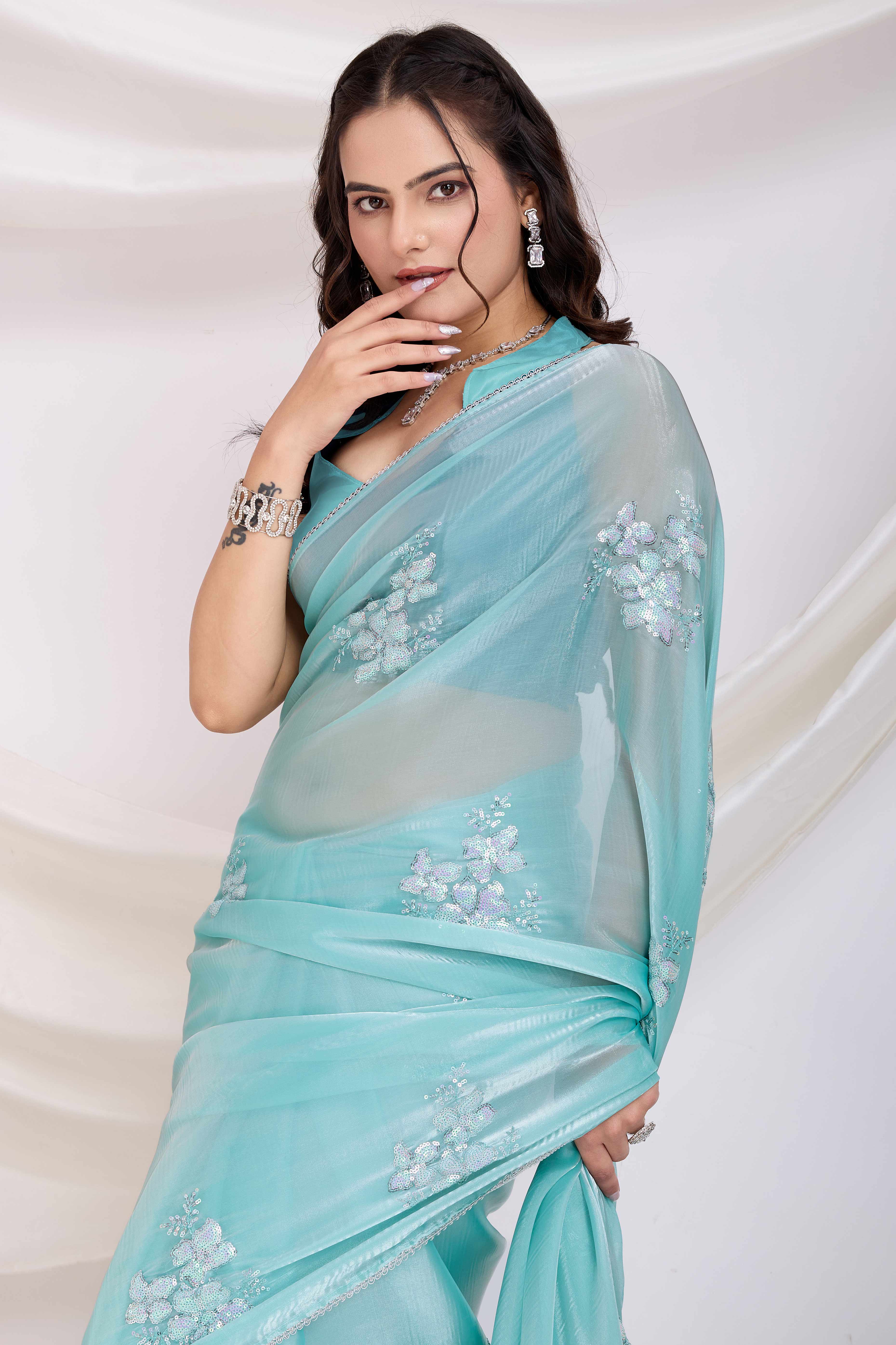 Turquoise Saree With Exquisite Floral Sequins Embroidery On Luxe Jimmy Choo Silk Blend
