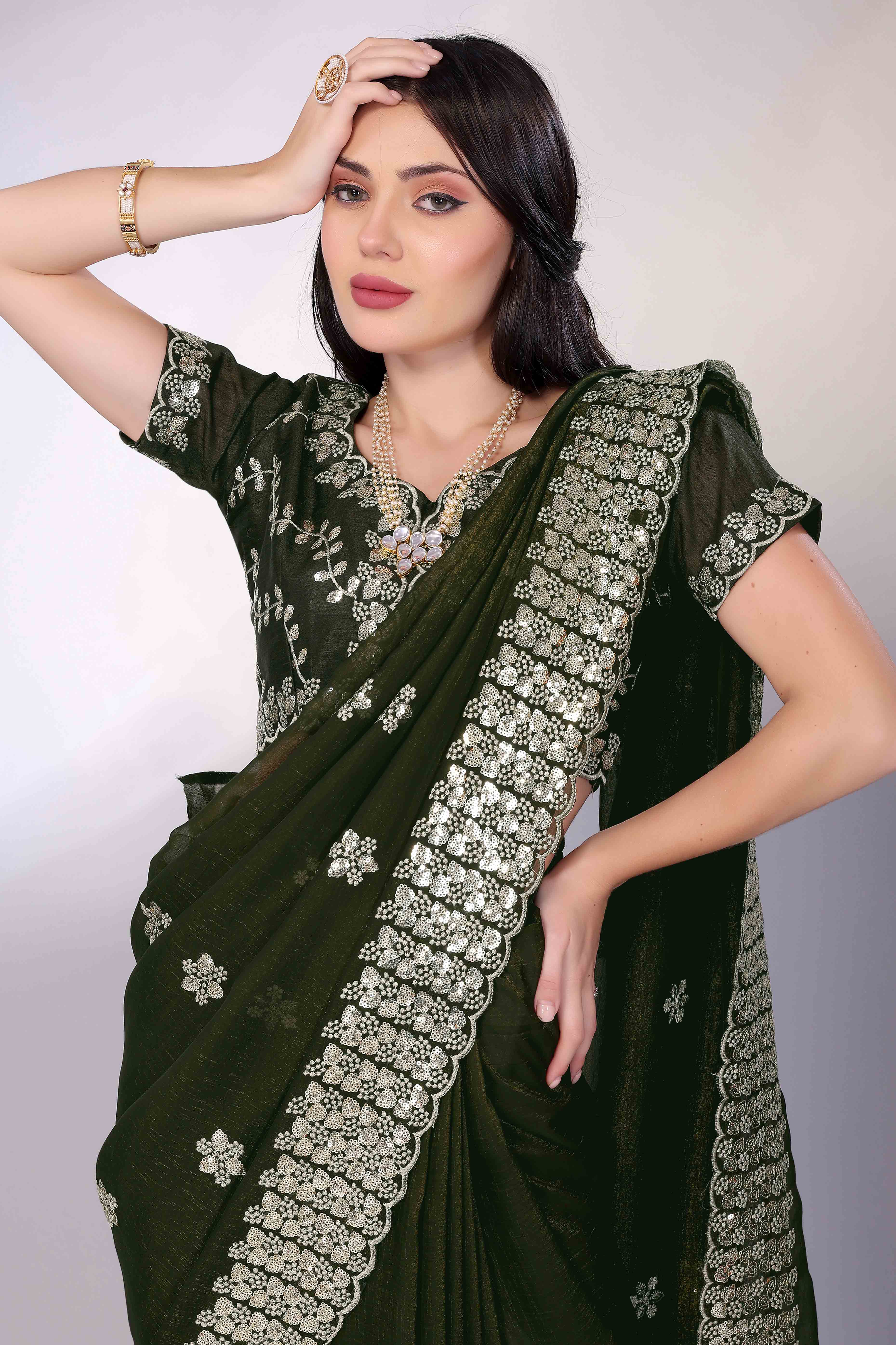 Green Crunchy Organza Silk Saree Adorned With Intricate Floral Sequins Embroidery