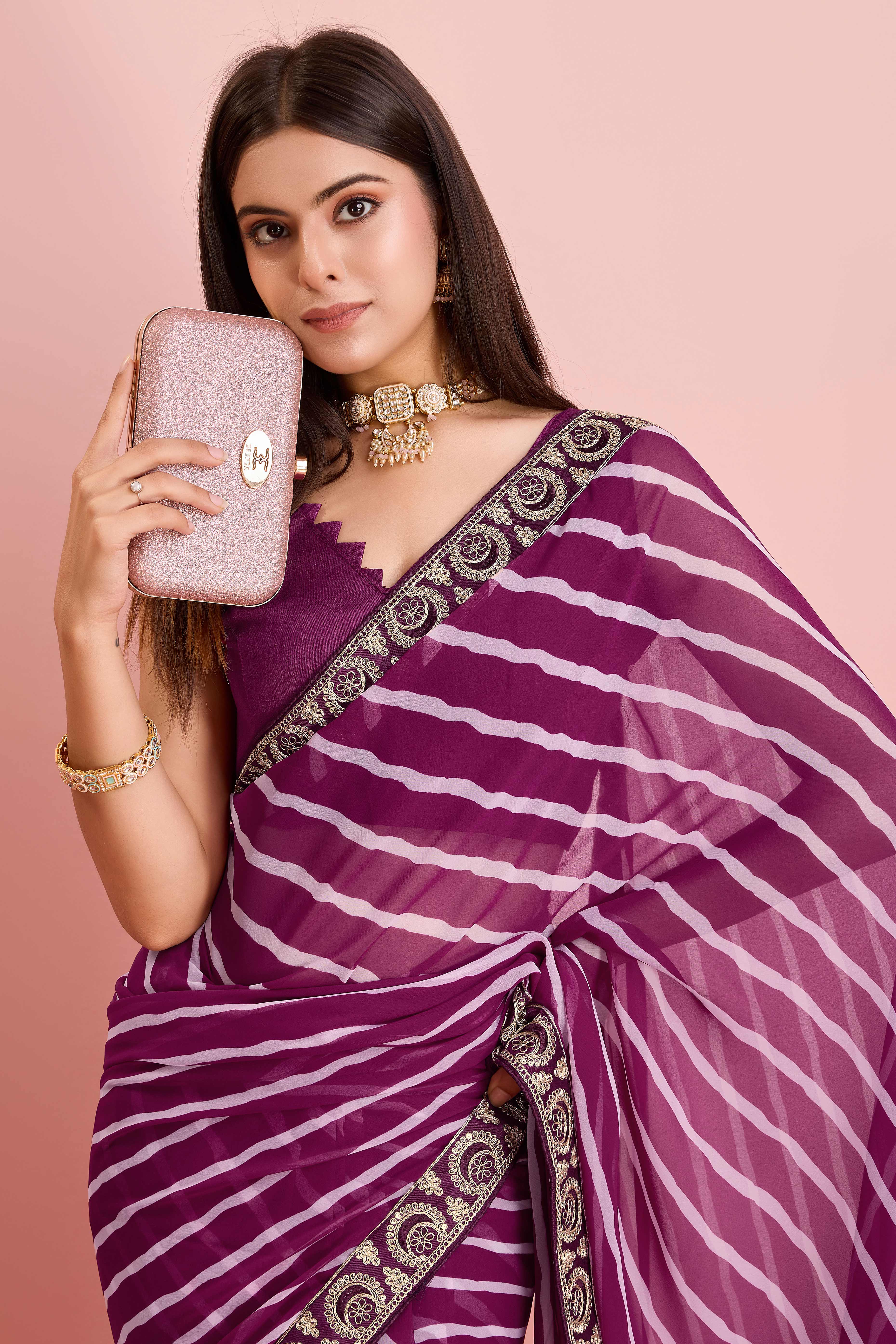Elegant Purple Leheriya Printed Saree in Flowing Georgette
