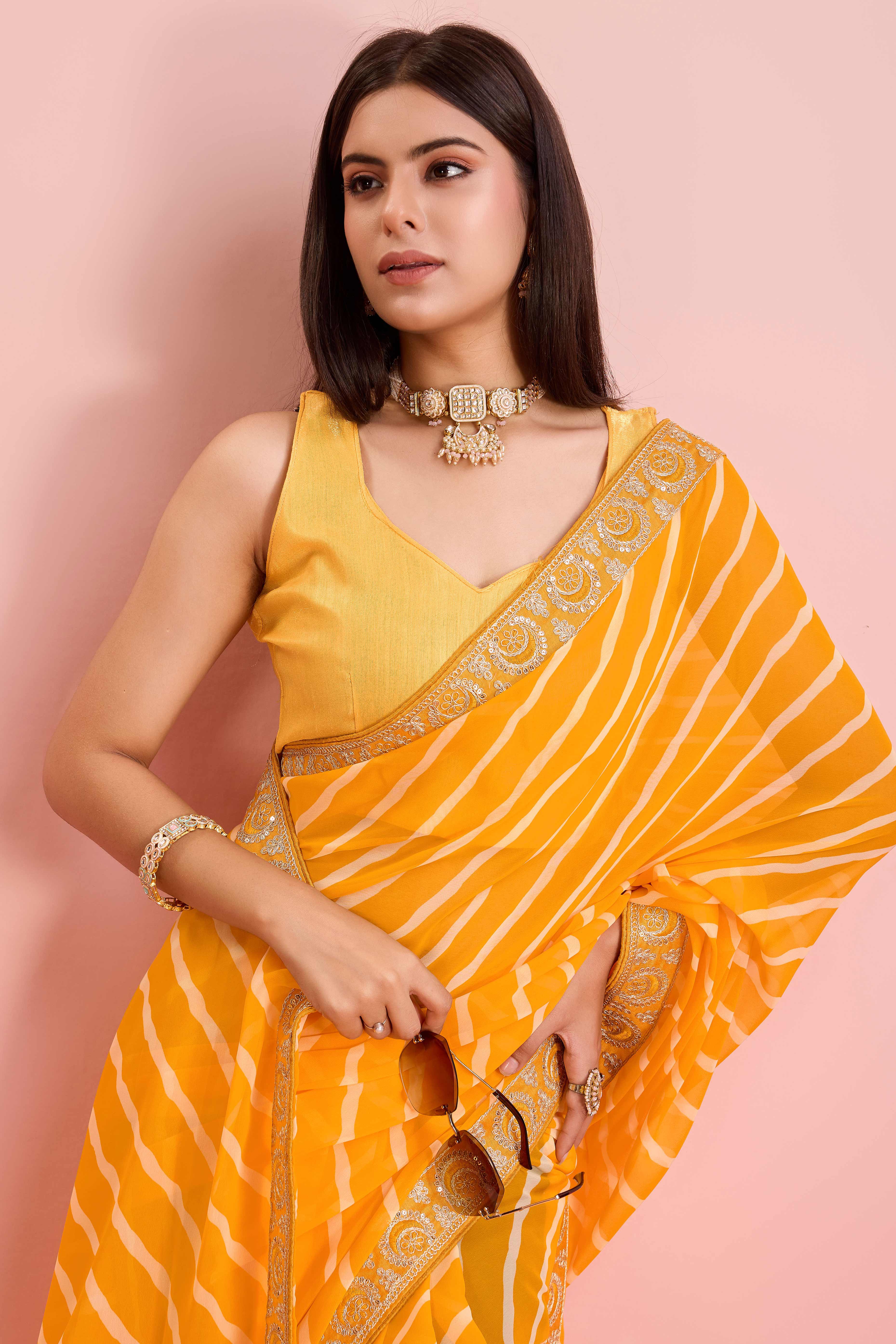 Elegant Yellow Leheriya Printed Saree in Flowing Georgette