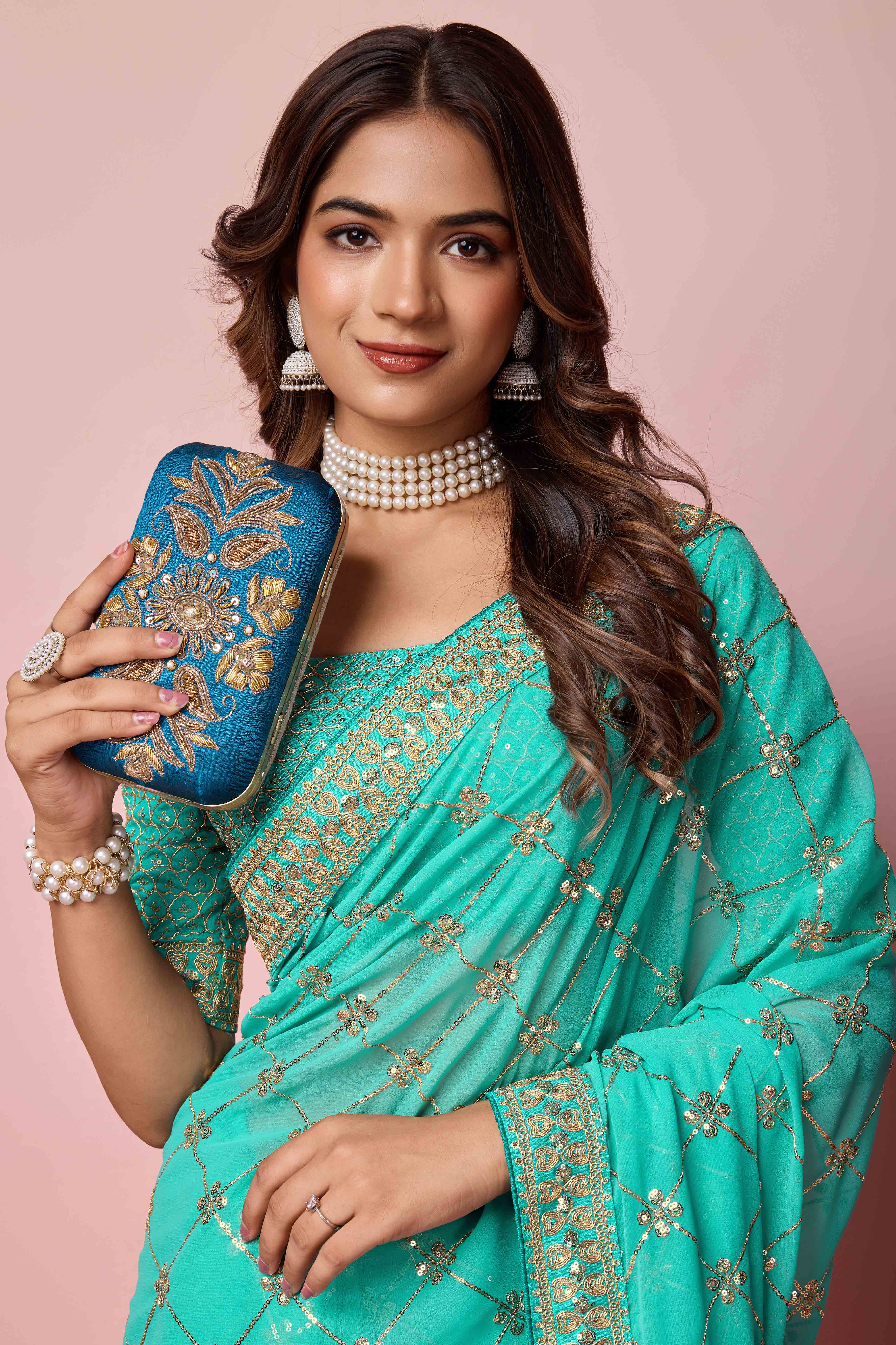 Turquoise Sequins Embroidered Georgette Saree