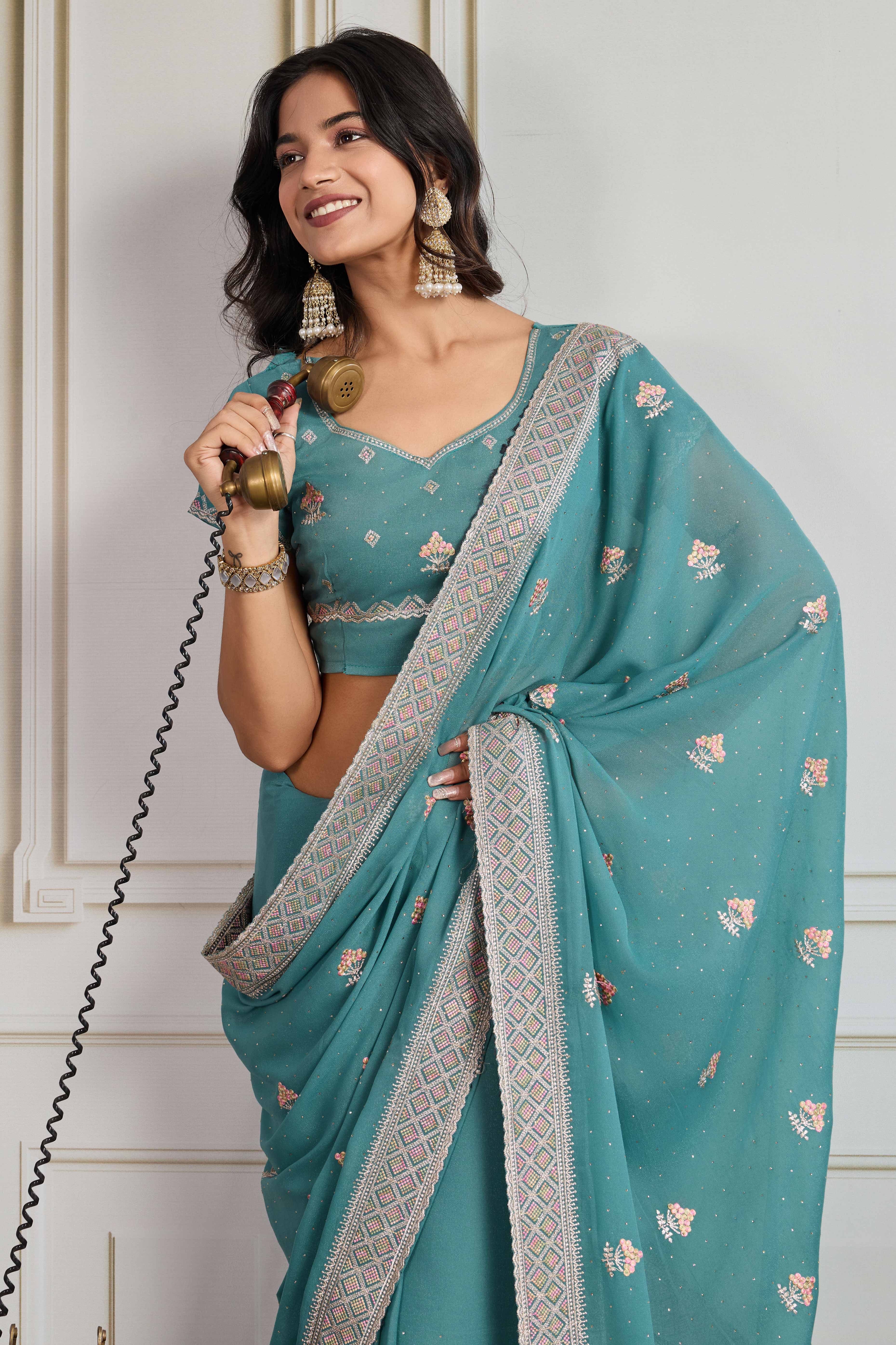 Teal Georgette Saree Featuring Embroidered and Stone Work