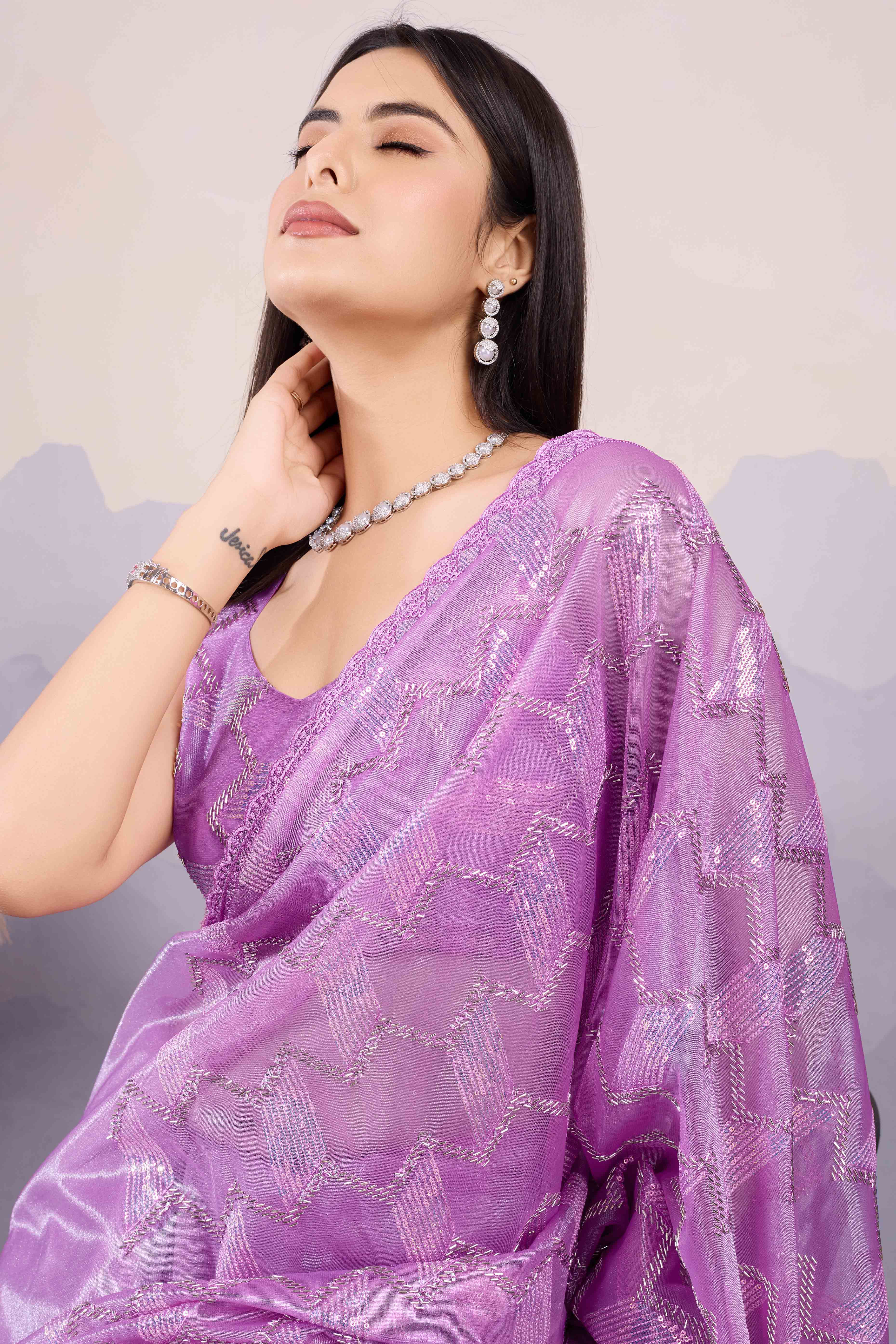 Purple Sequins Embroidered Twill Net Saree