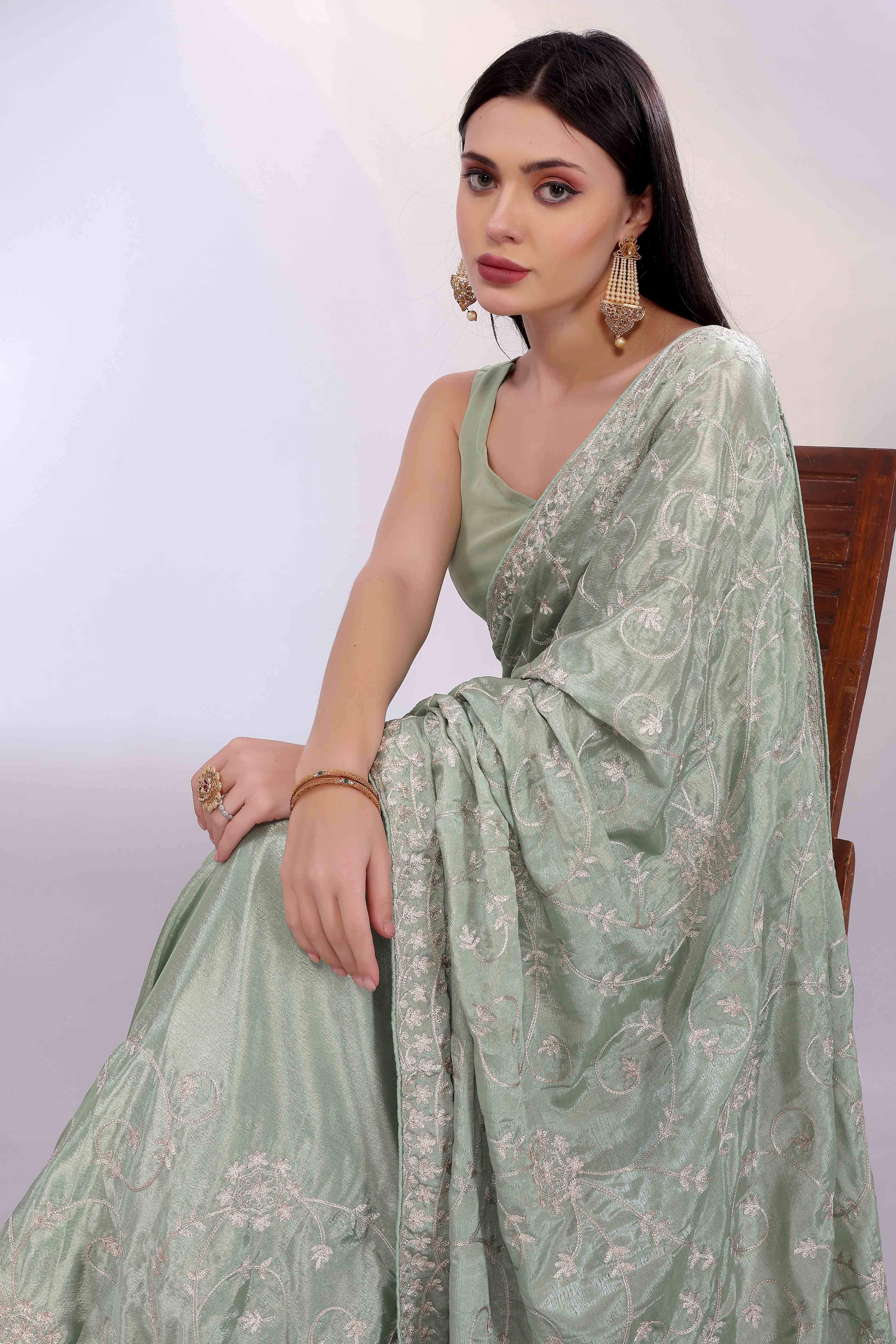 Sage Green Chinon Silk Saree Adorned With Fine Floral Thread Work