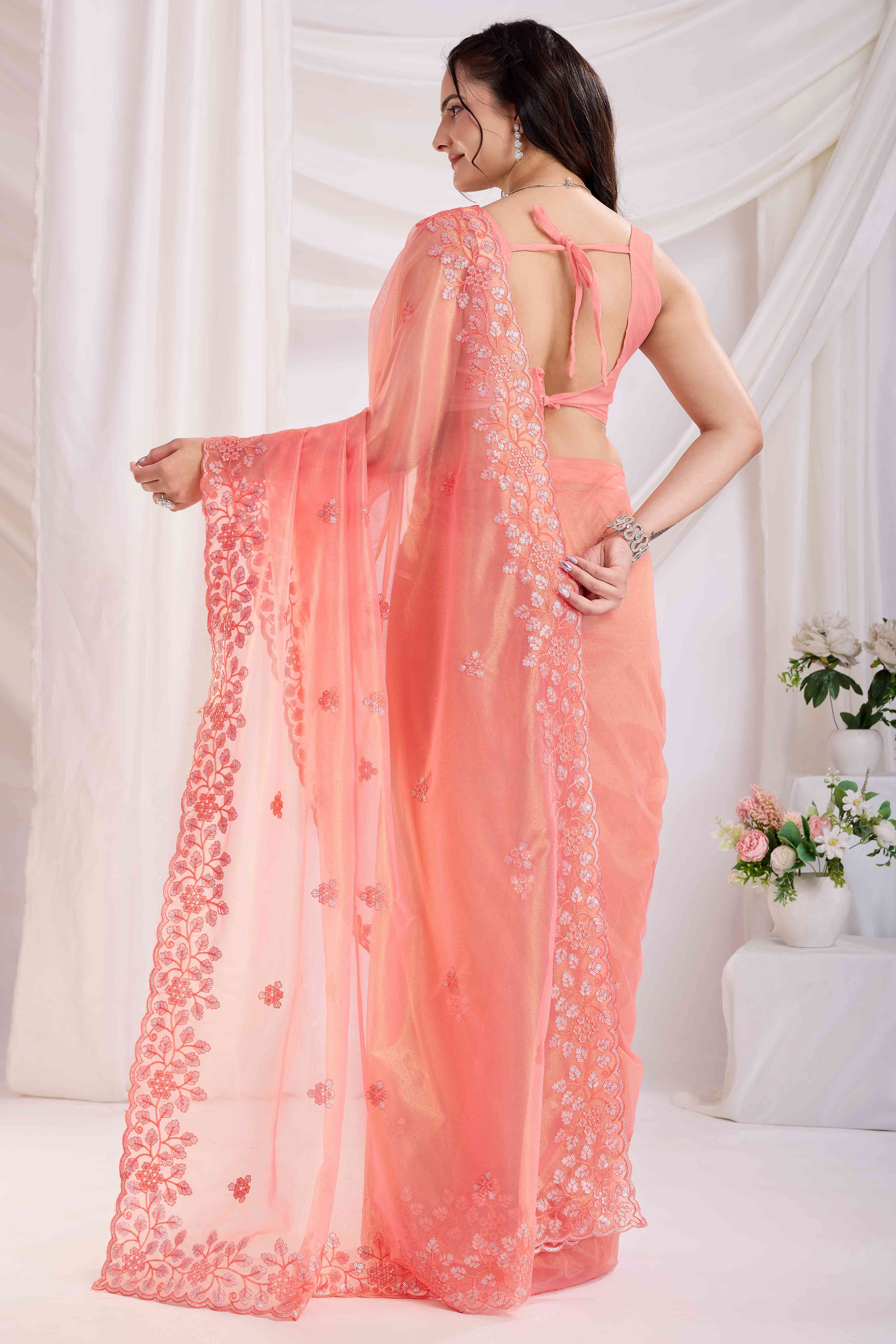 Peach Twill Net Saree Embellished With Sequin Floral Embroidery