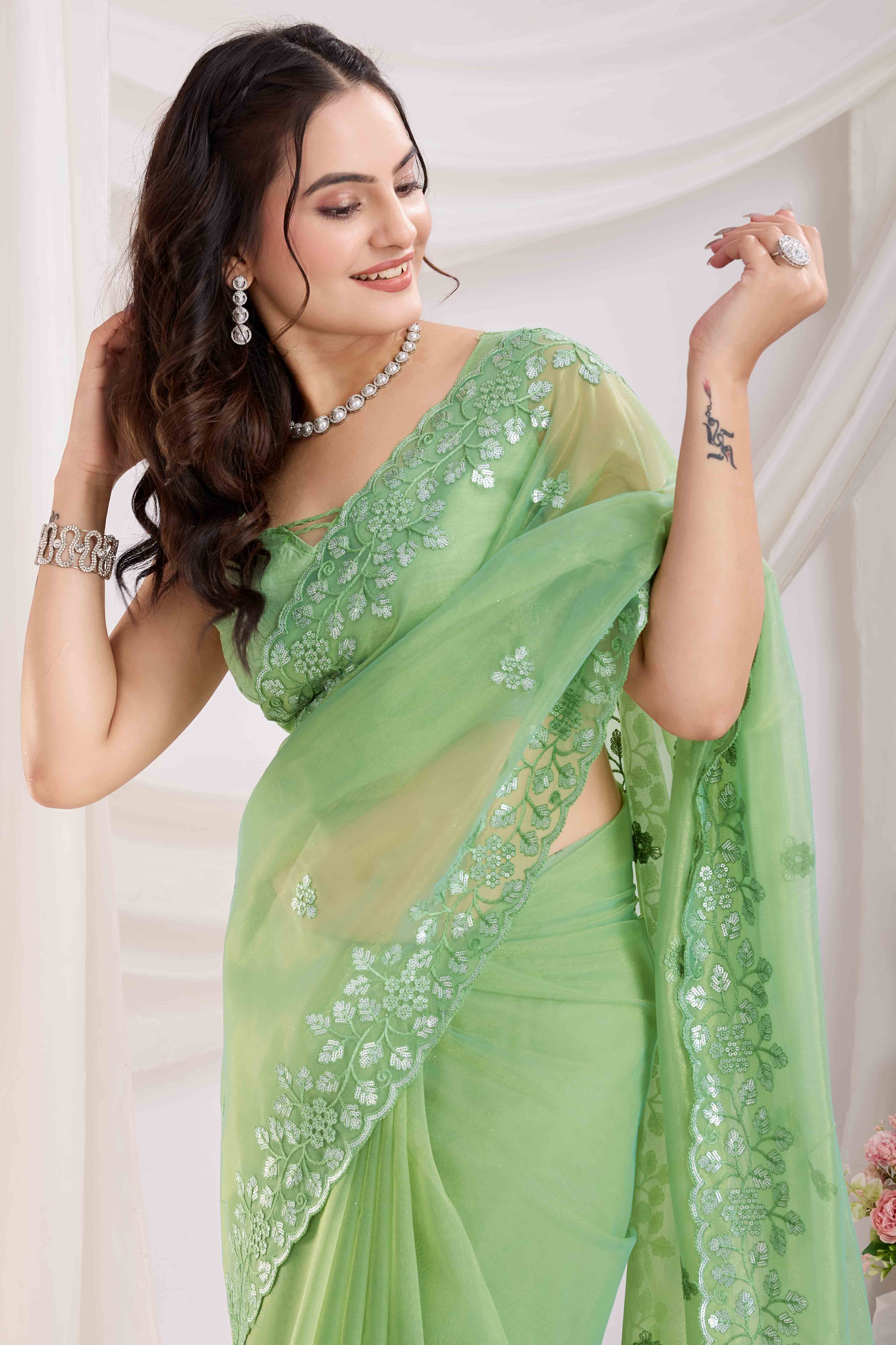 Green Twill Net Saree Embellished With Sequin Floral Embroidery