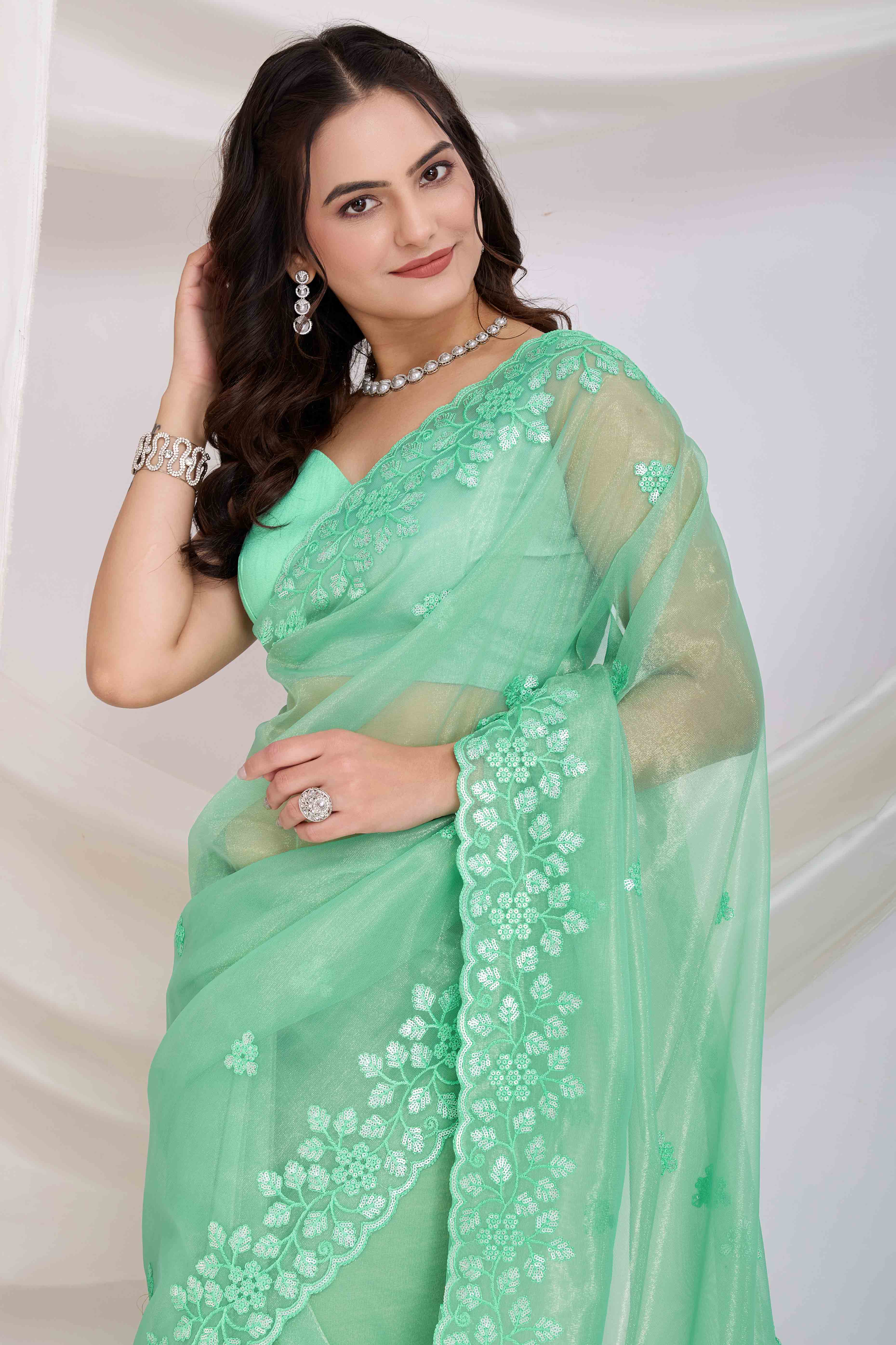 Sea Green Twill Net Saree Embellished With Sequin Floral Embroidery