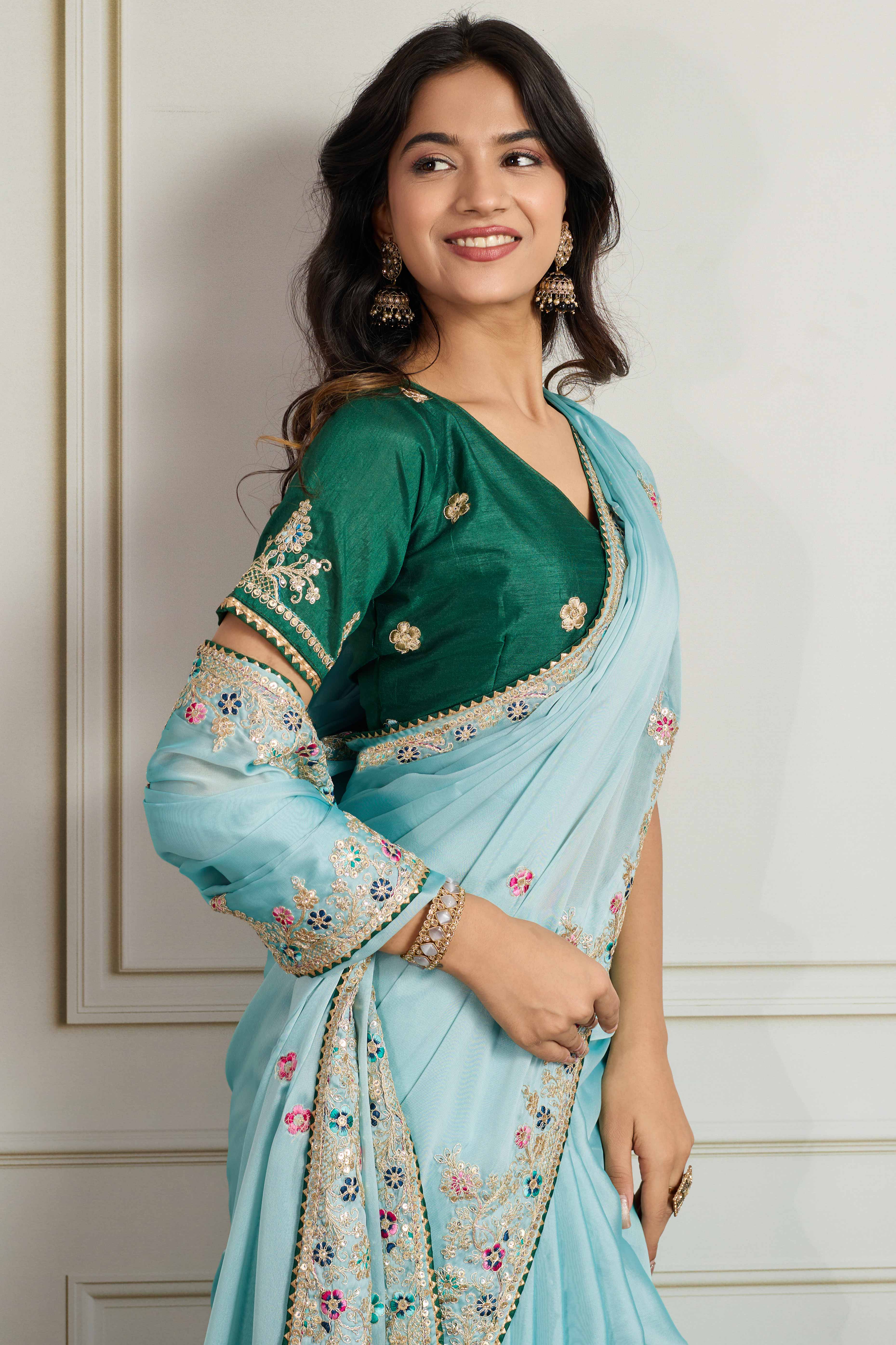 Aqua Blue Star Georgette Party Saree with Sequins and Floral Embroidery