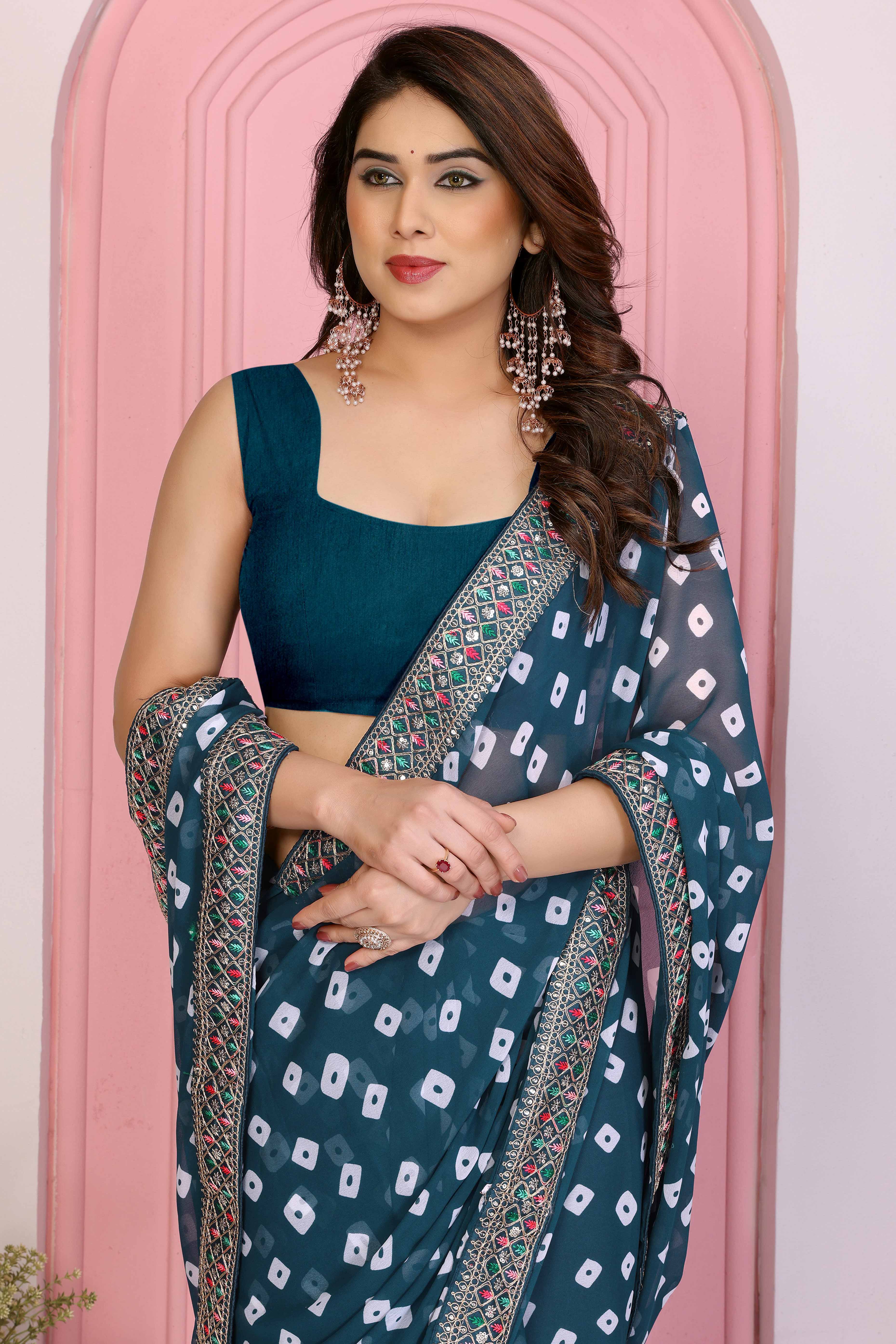 Teal Georgette Saree With Bandhani Print & Exquisite Cording Embroidery Border