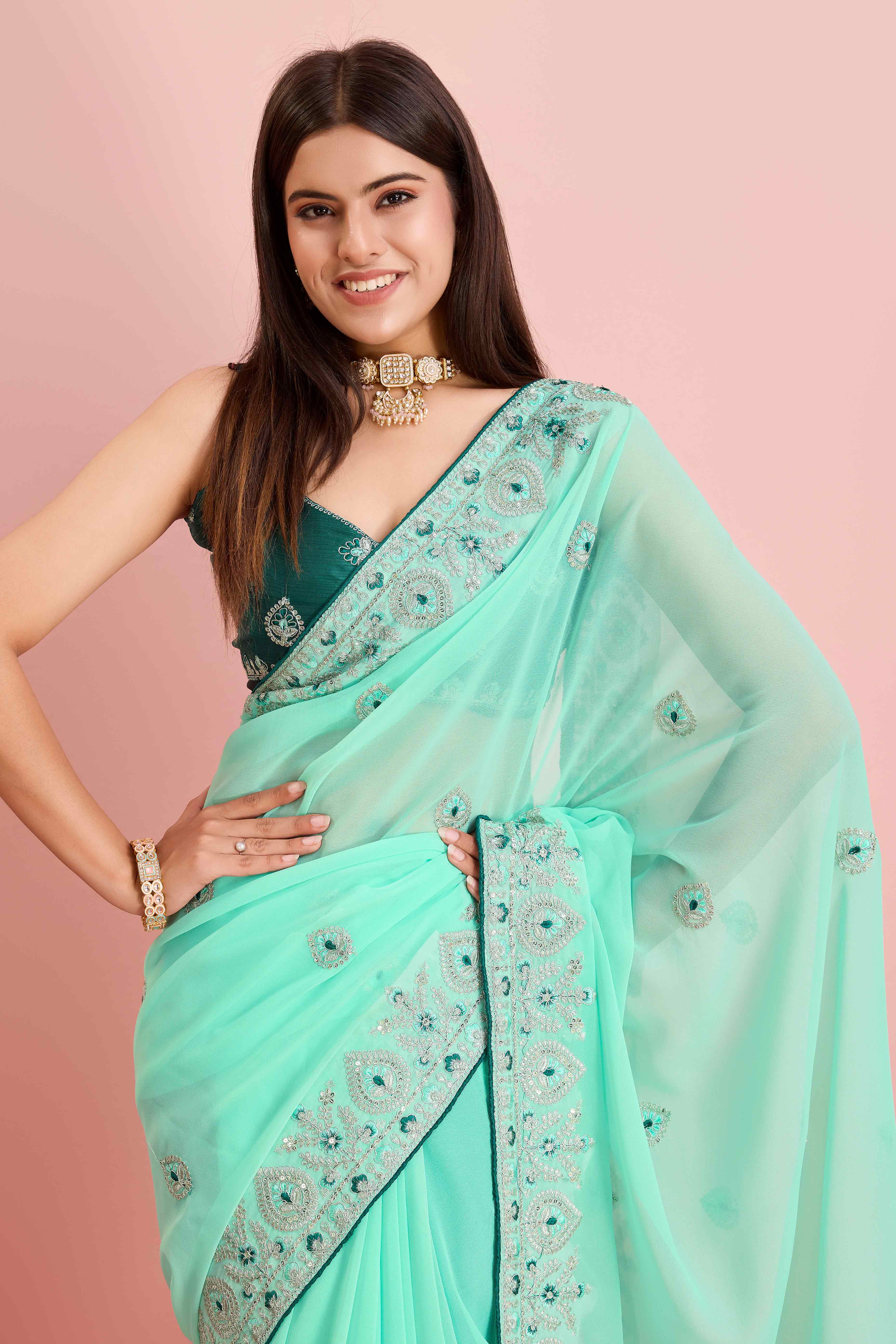 Turquoise Floral Sequins Embroidered Georgette Saree