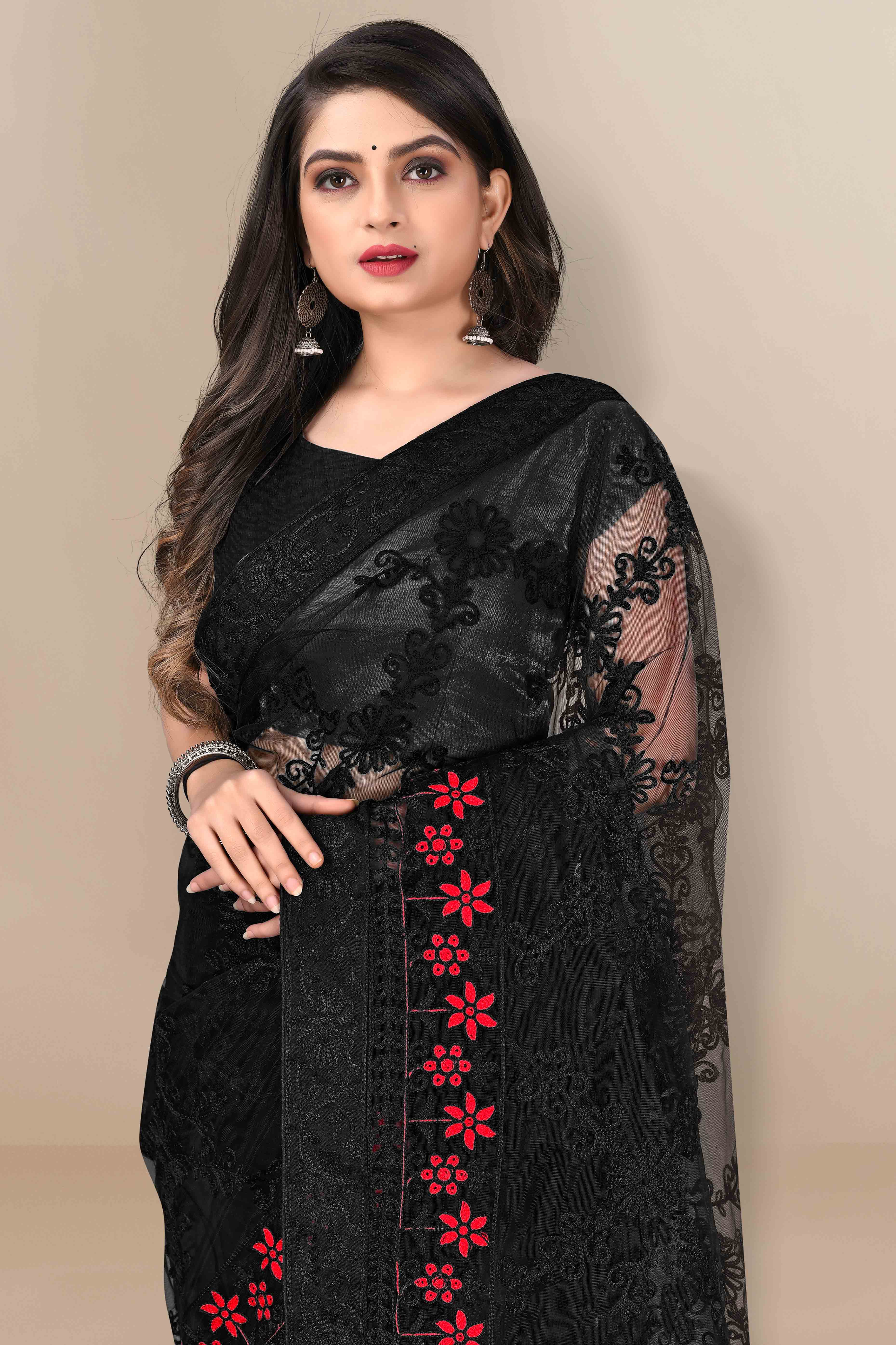 Black Party Wear Net Saree Featuring Rich Floral Embroidery