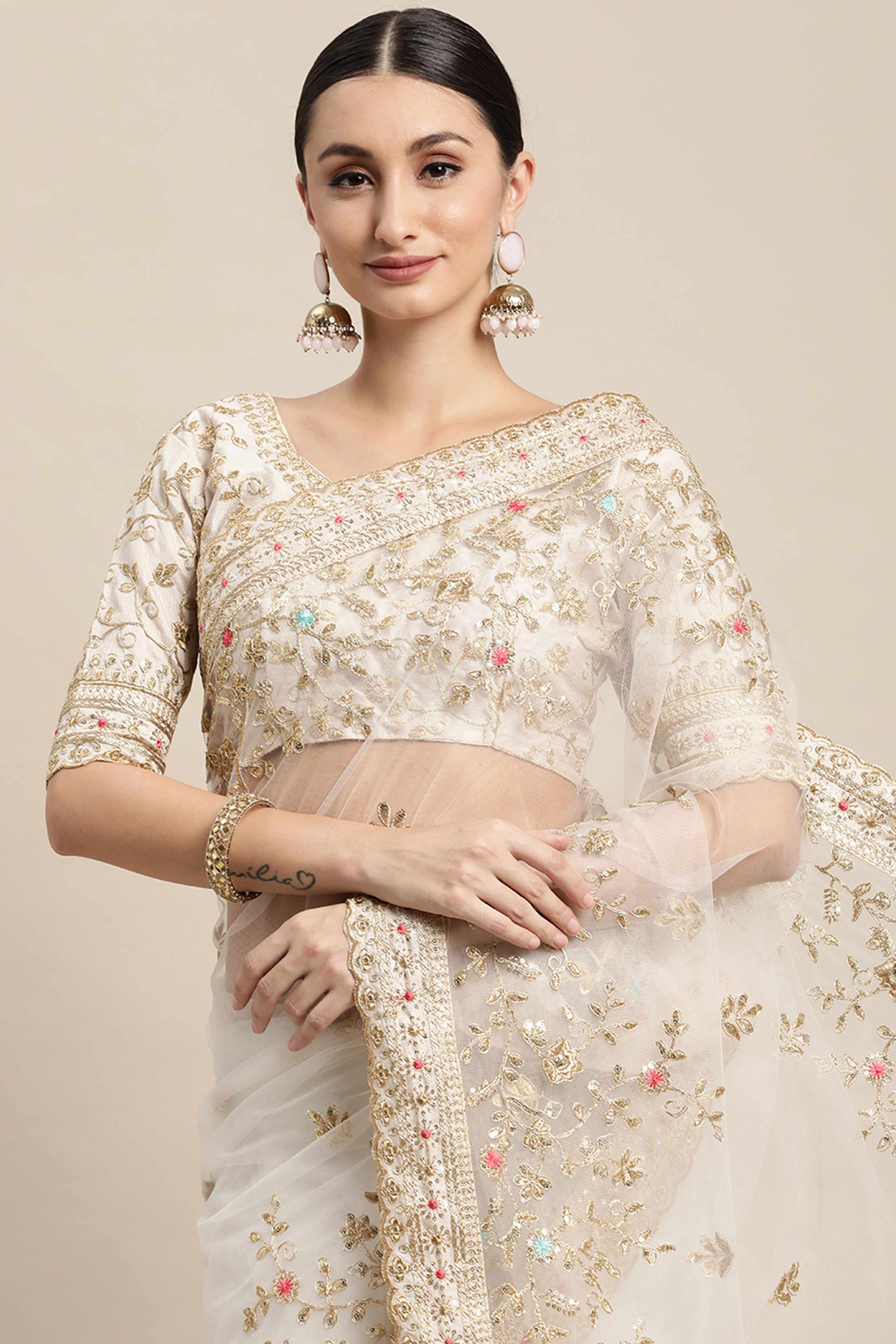 Cream Soft Net Saree With Delicate Floral Embroidery & Shimmering Sequins Work