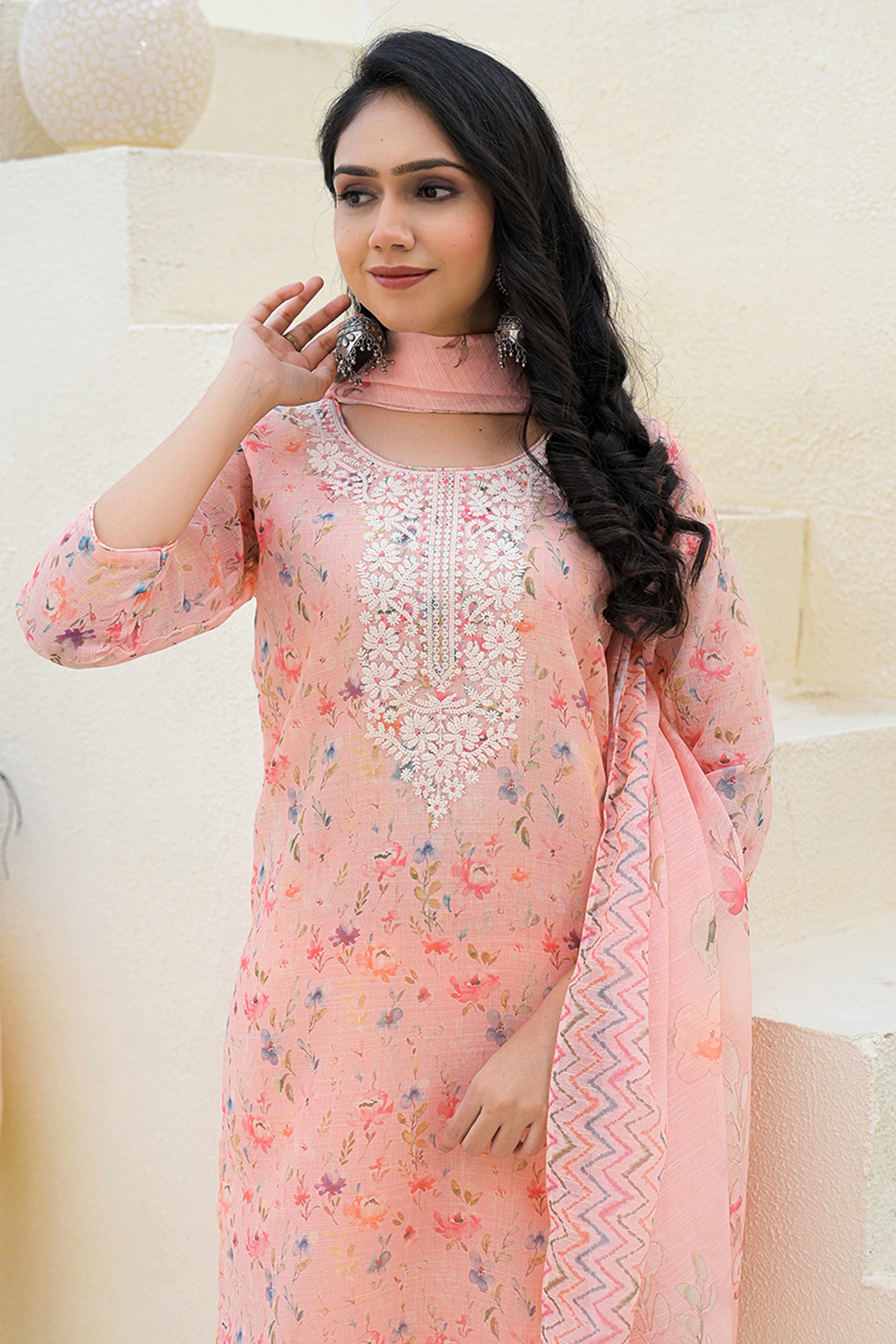 Graceful Peach Floral Printed Suit in Linen with Delicate Chikankari Embroidery