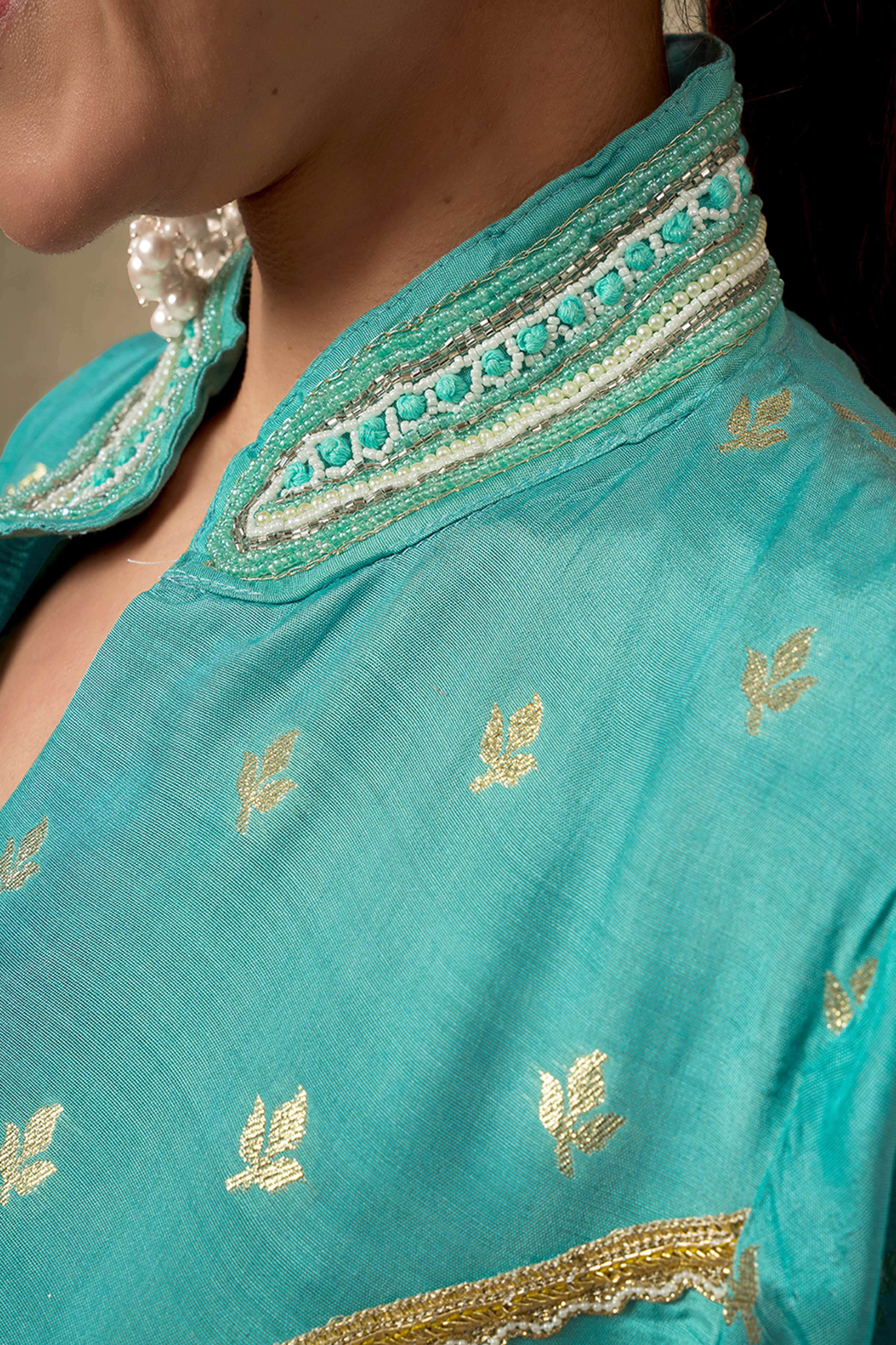 Turquoise Silk Blend A-Line Top Bottom Set With Zari Weaving And Stone Work