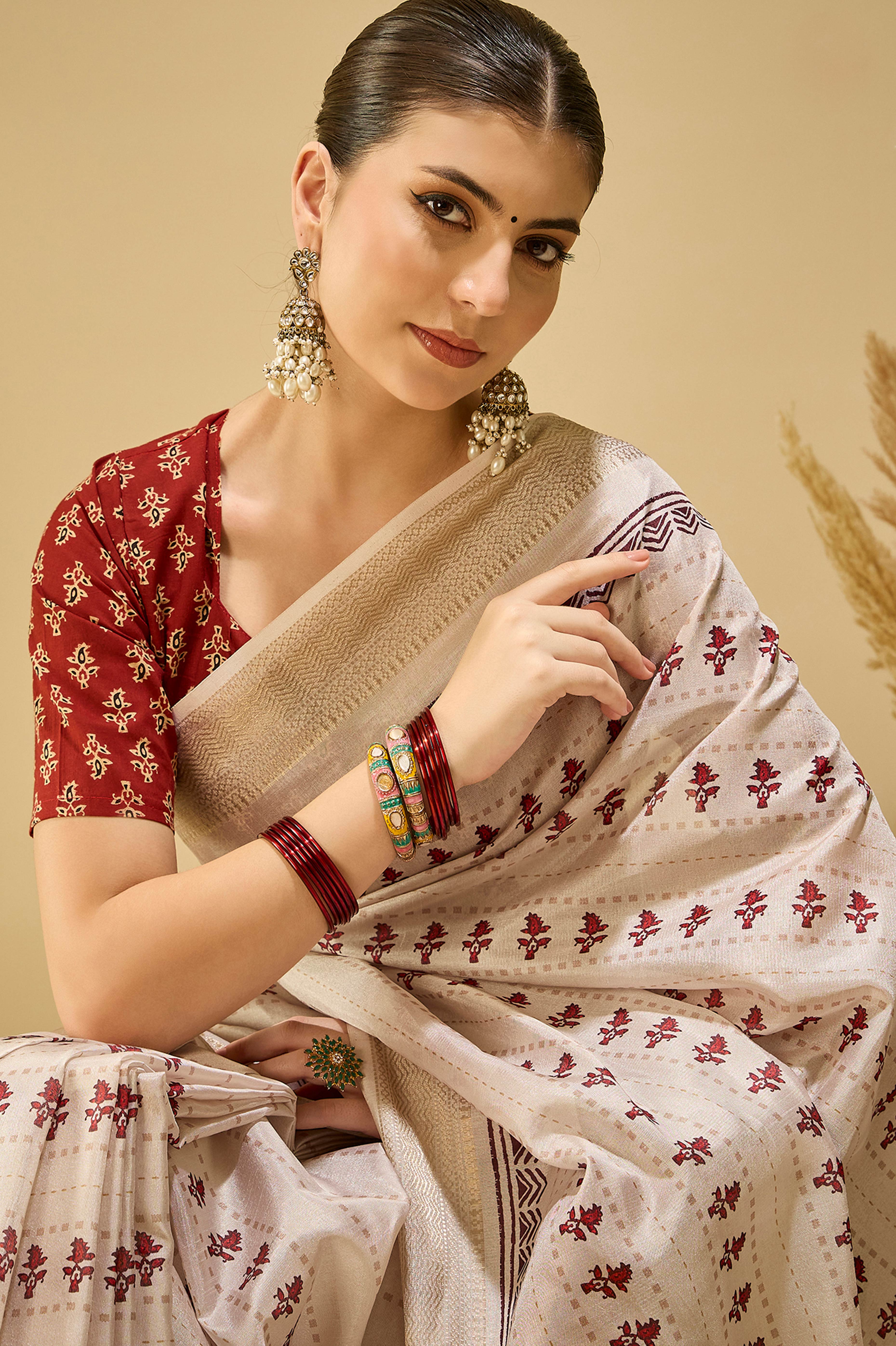 Soft Cream Katki Cotton-Silk Saree With Subtle Floral Motifs & Tassel Edge Pallu