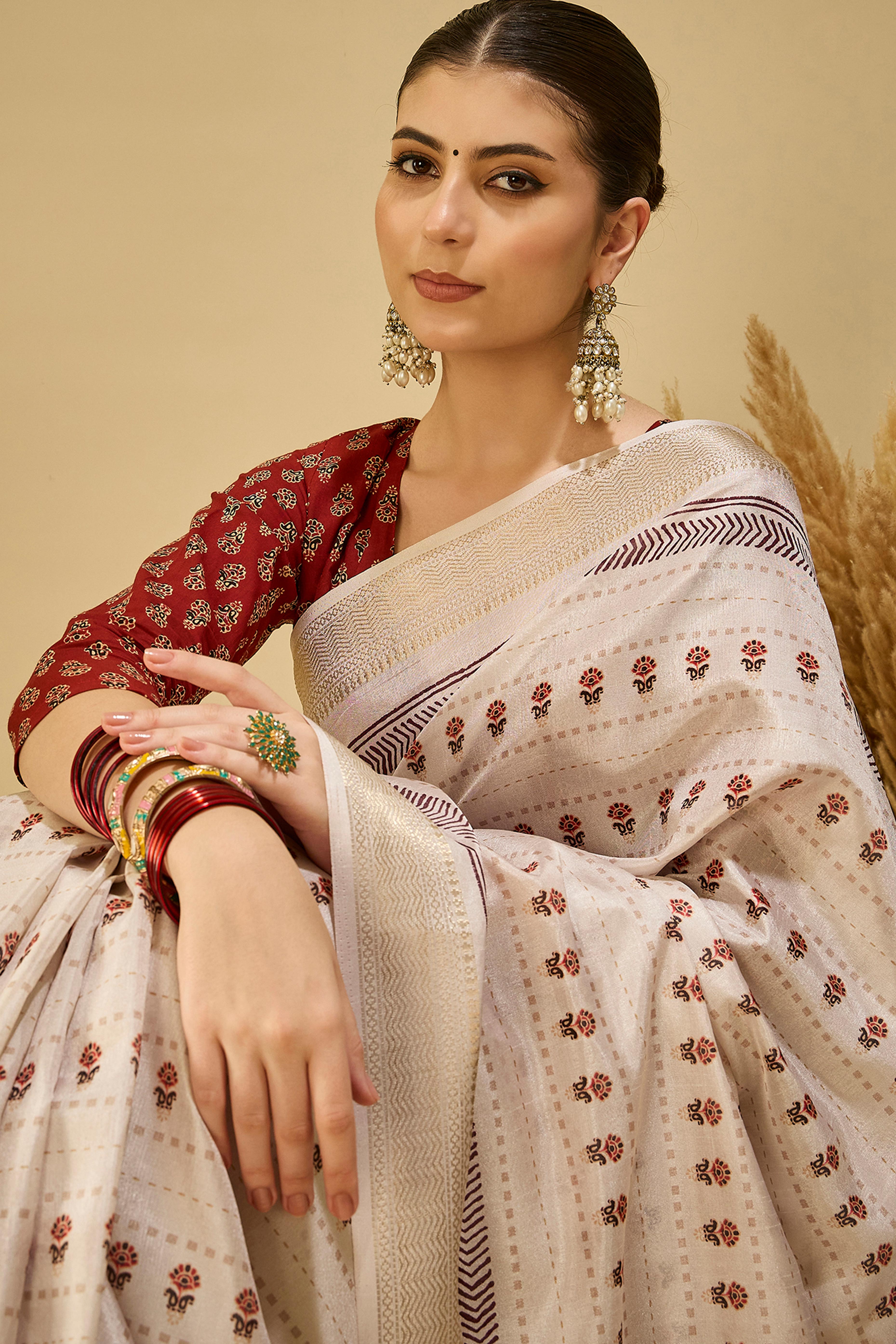 Timeless Cream Katki Cotton Silk Saree With Blooming Floral Prints & Tassel Draped Pallu