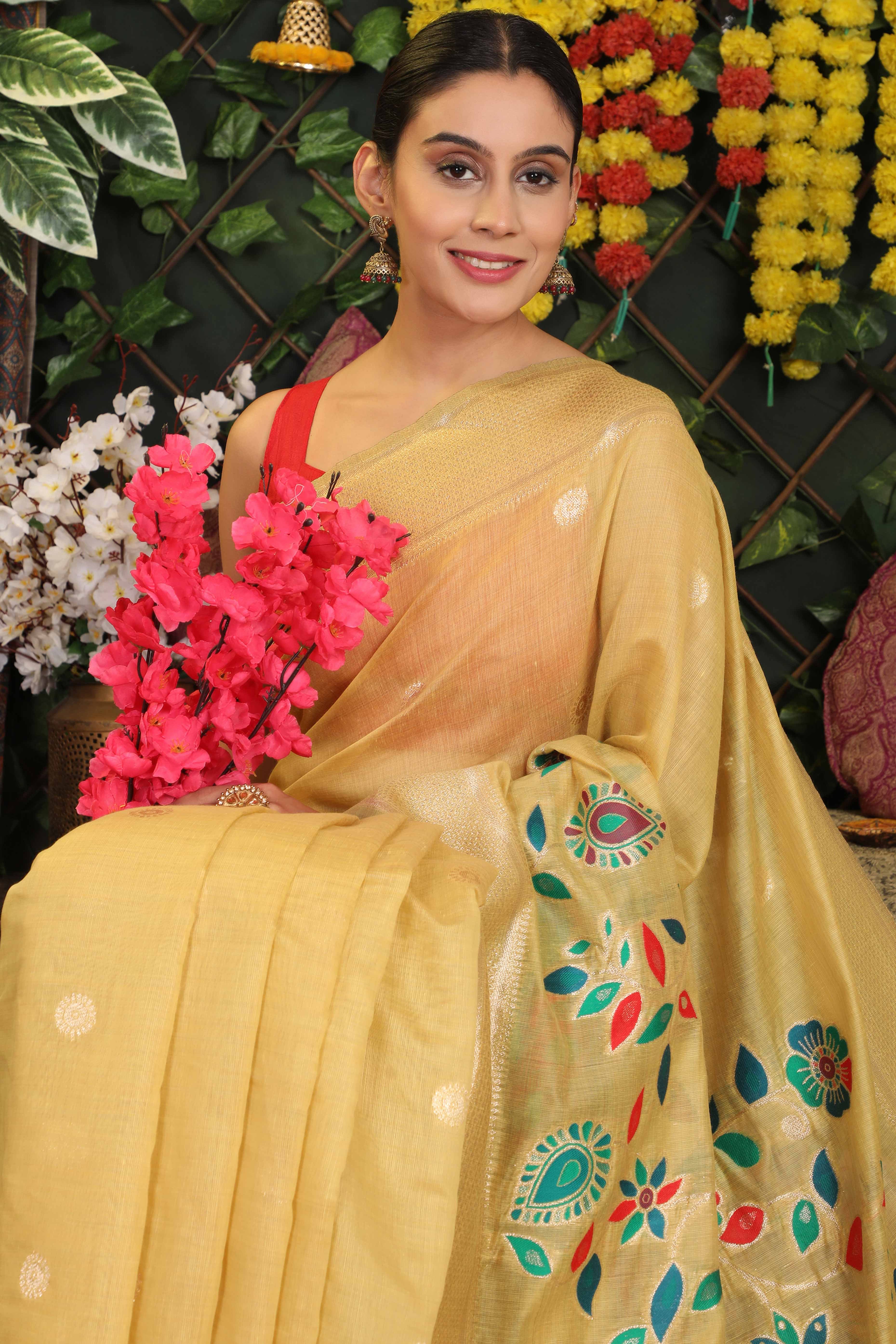 Light Yellow Linen Cotton Saree Showcasing Floral & Peacock Zari Woven Design