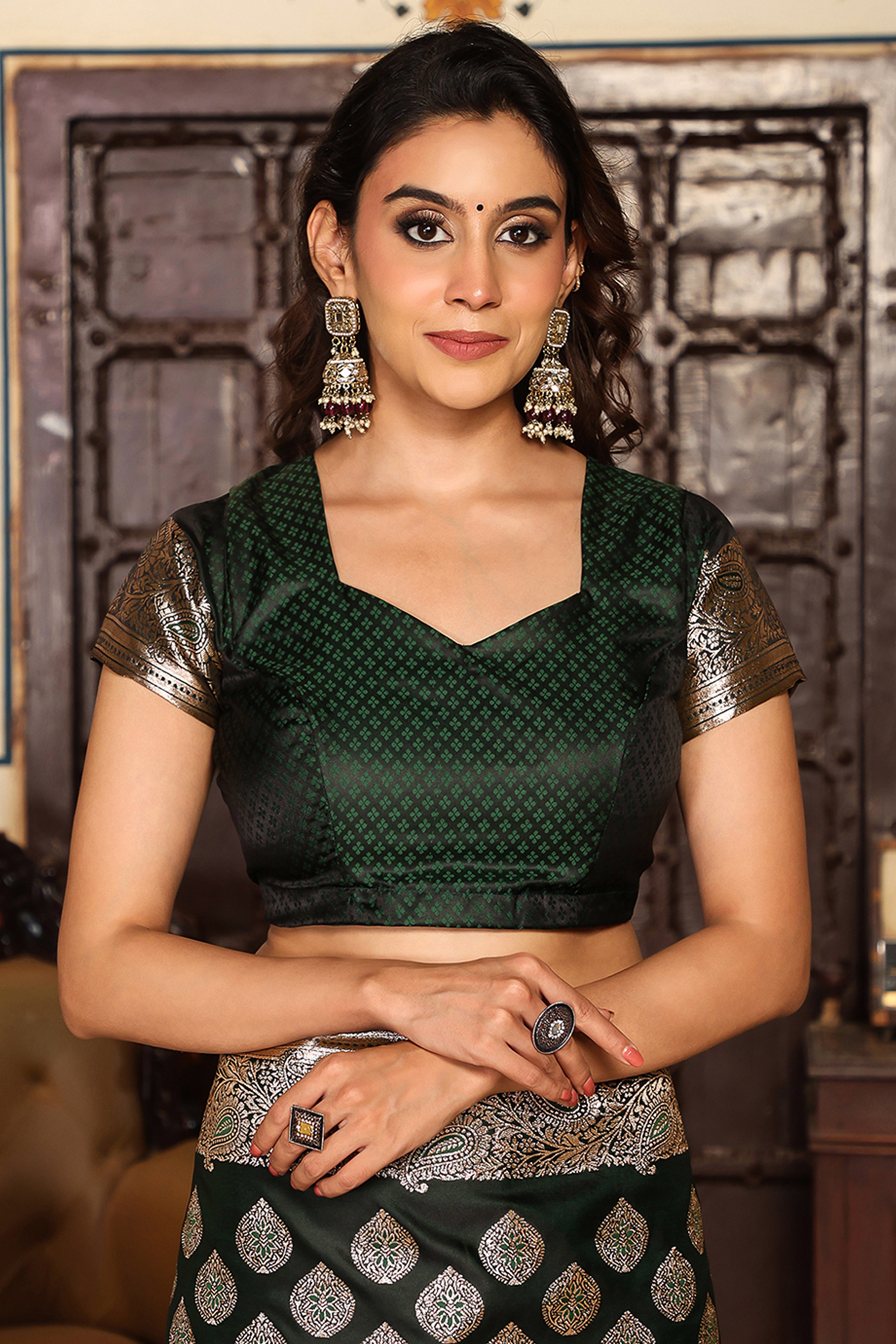 Festive Dark Green Saree in Silk Blend with Exquisite Zari Weaving Work