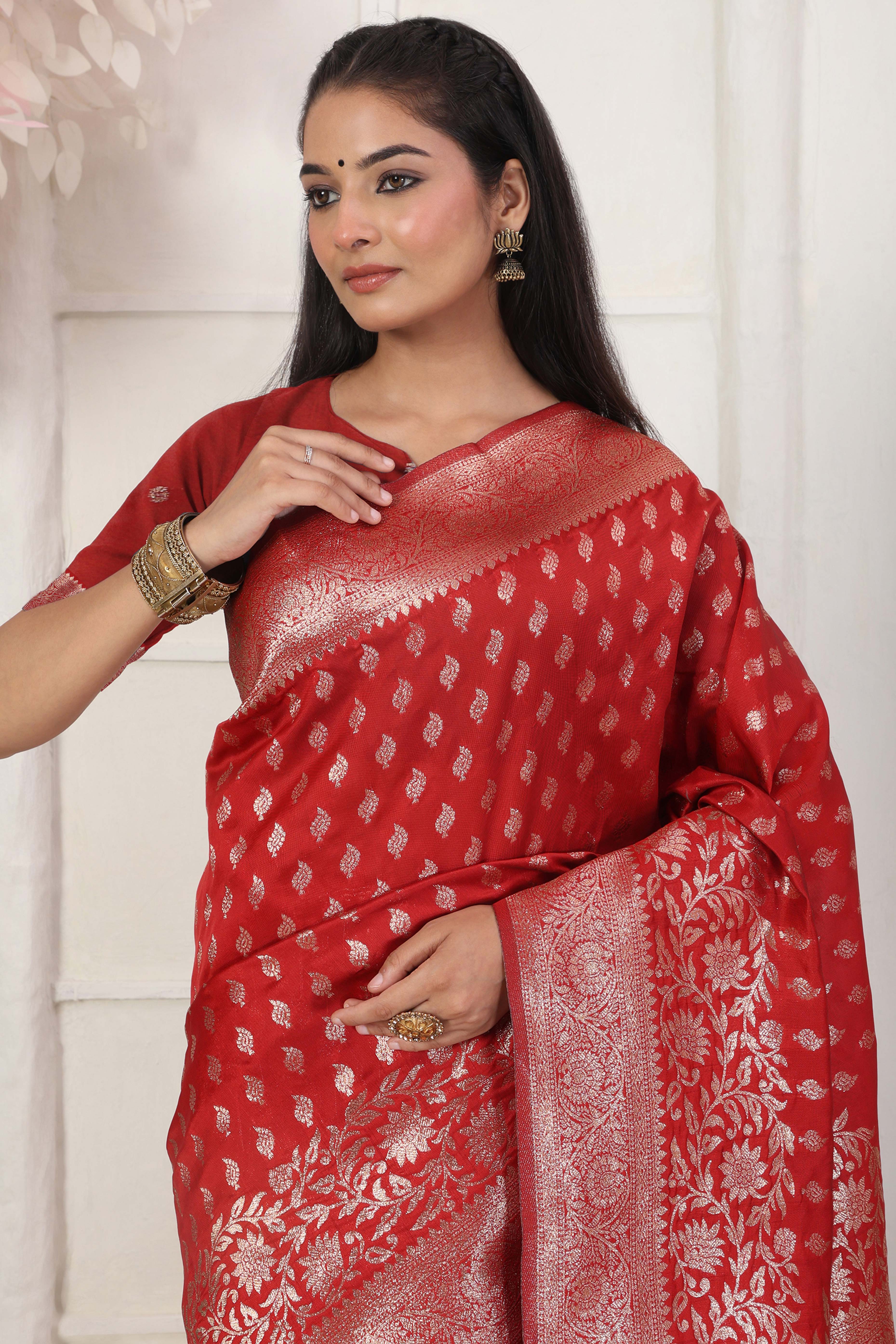 Red Traditional Lichi Silk Blend Saree Enhanced With Floral Zari Weaving & Tassel Pallu
