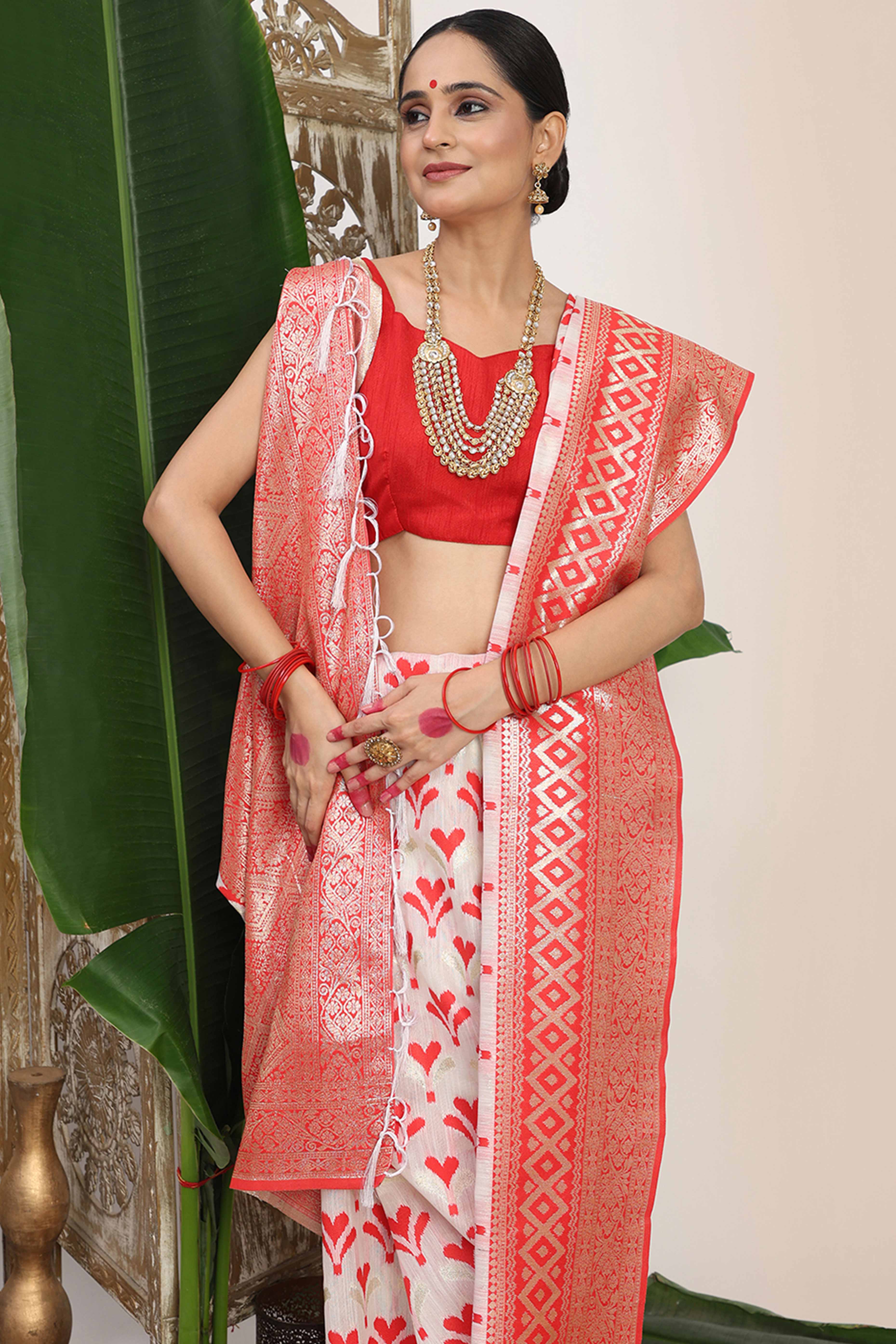 White & Red  Fusion Linen Cotton Saree With Classic Zari Weaving And Soft Tassel Accents