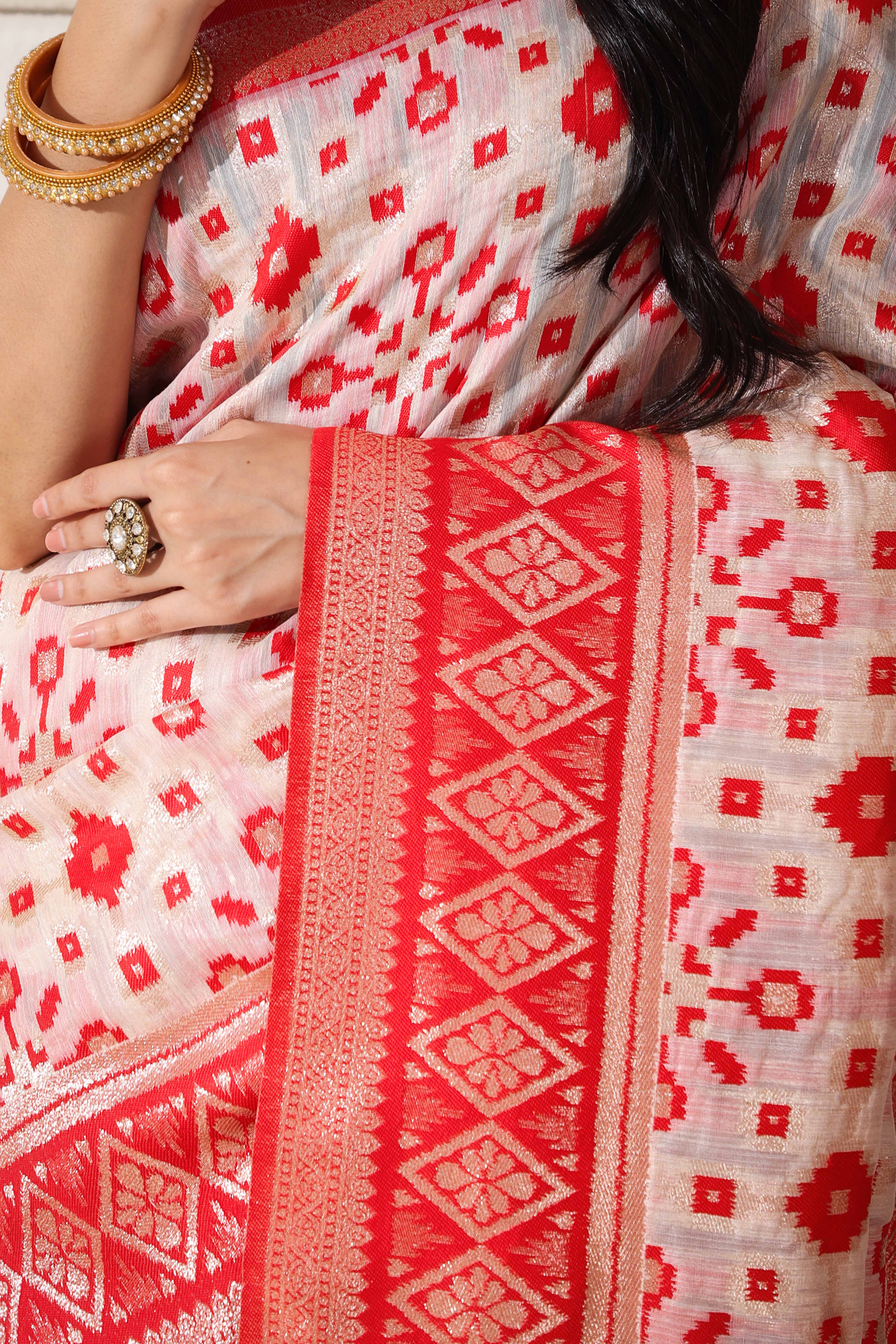 Elegant White & Red Zari Woven Linen Cotton Saree With Graceful Tassel Detailing