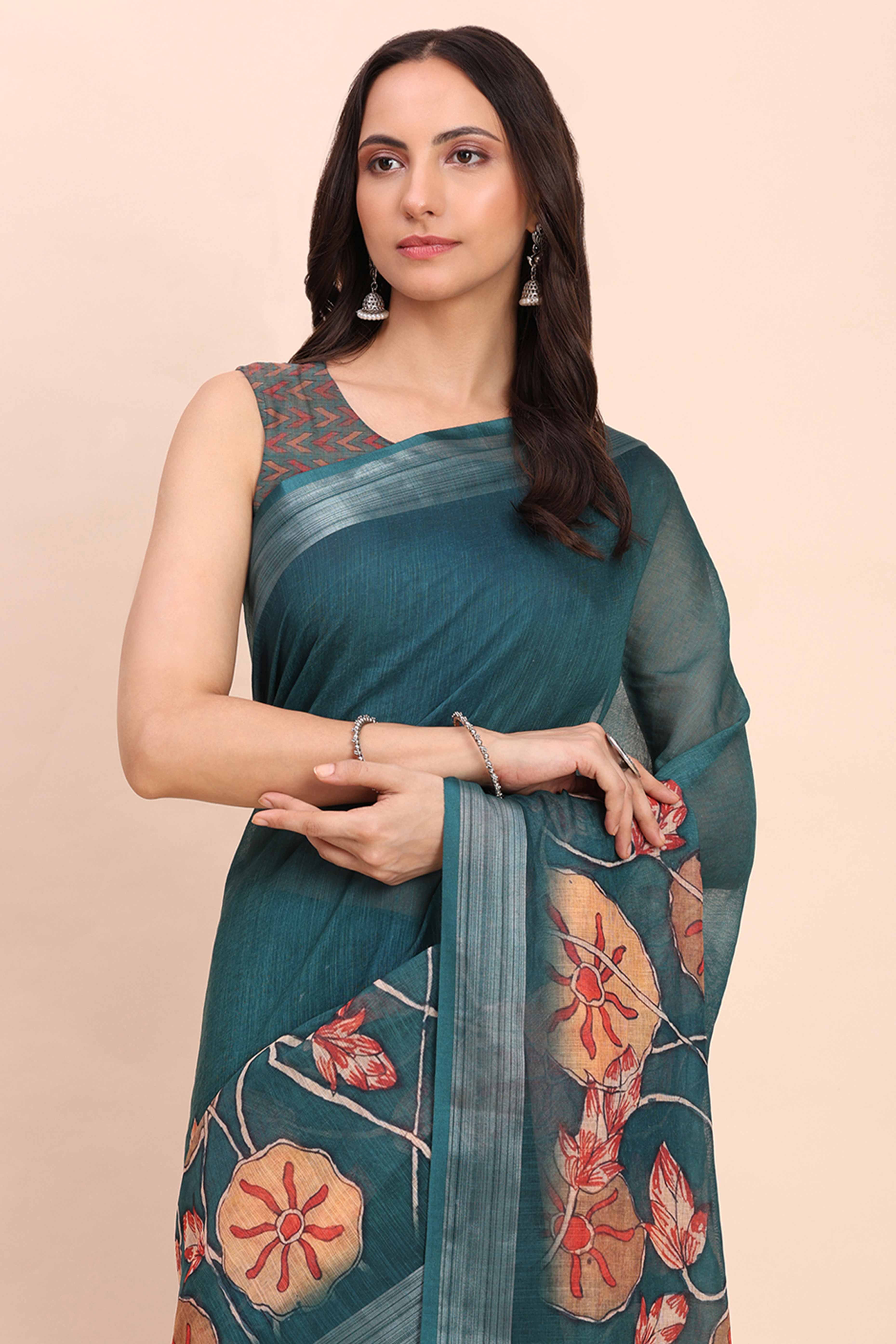 Teal Blue Linen Cotton Saree Featuring Floral Prints & Woven Border