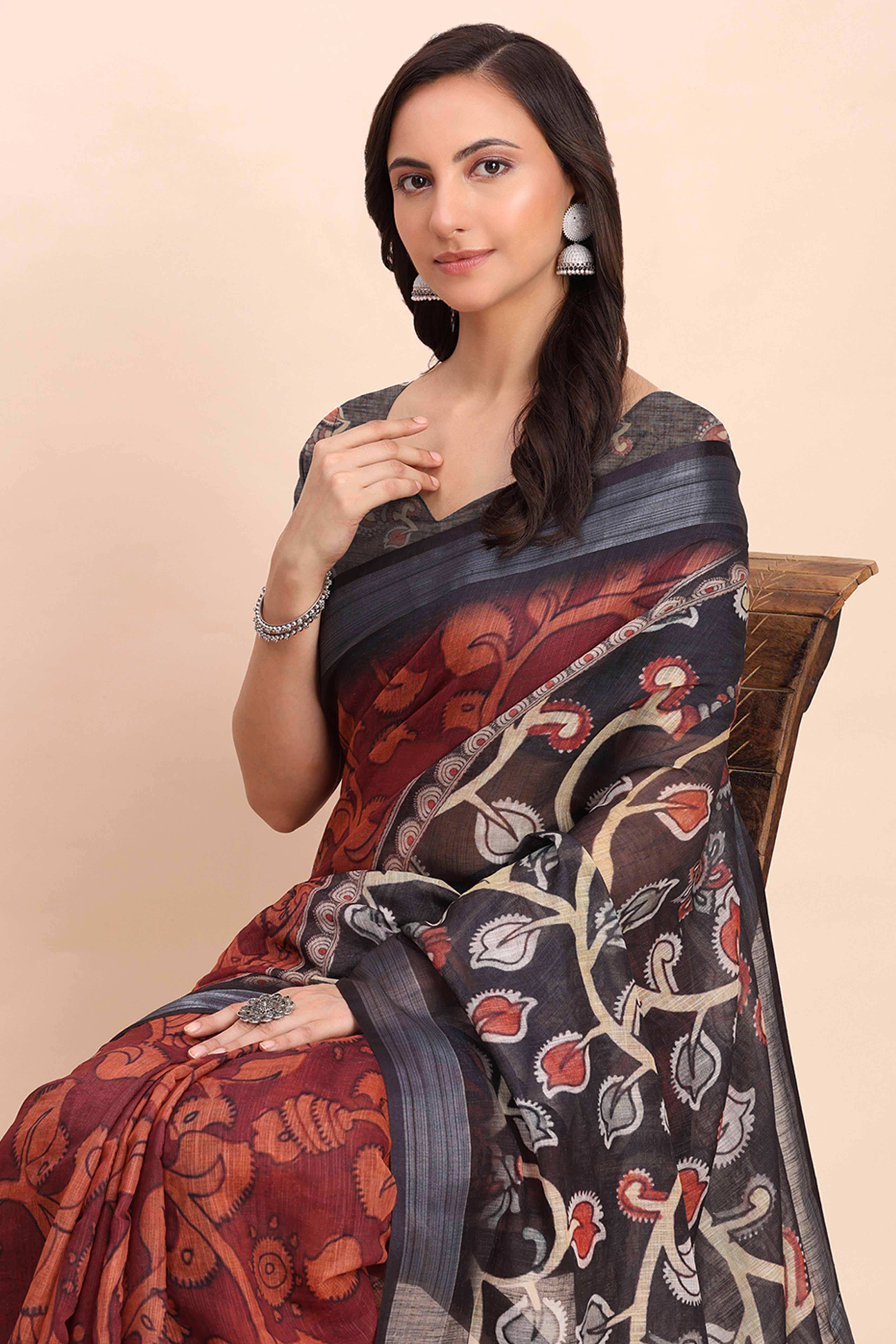 Maroon Linen Saree with Intricate Silver Weaving