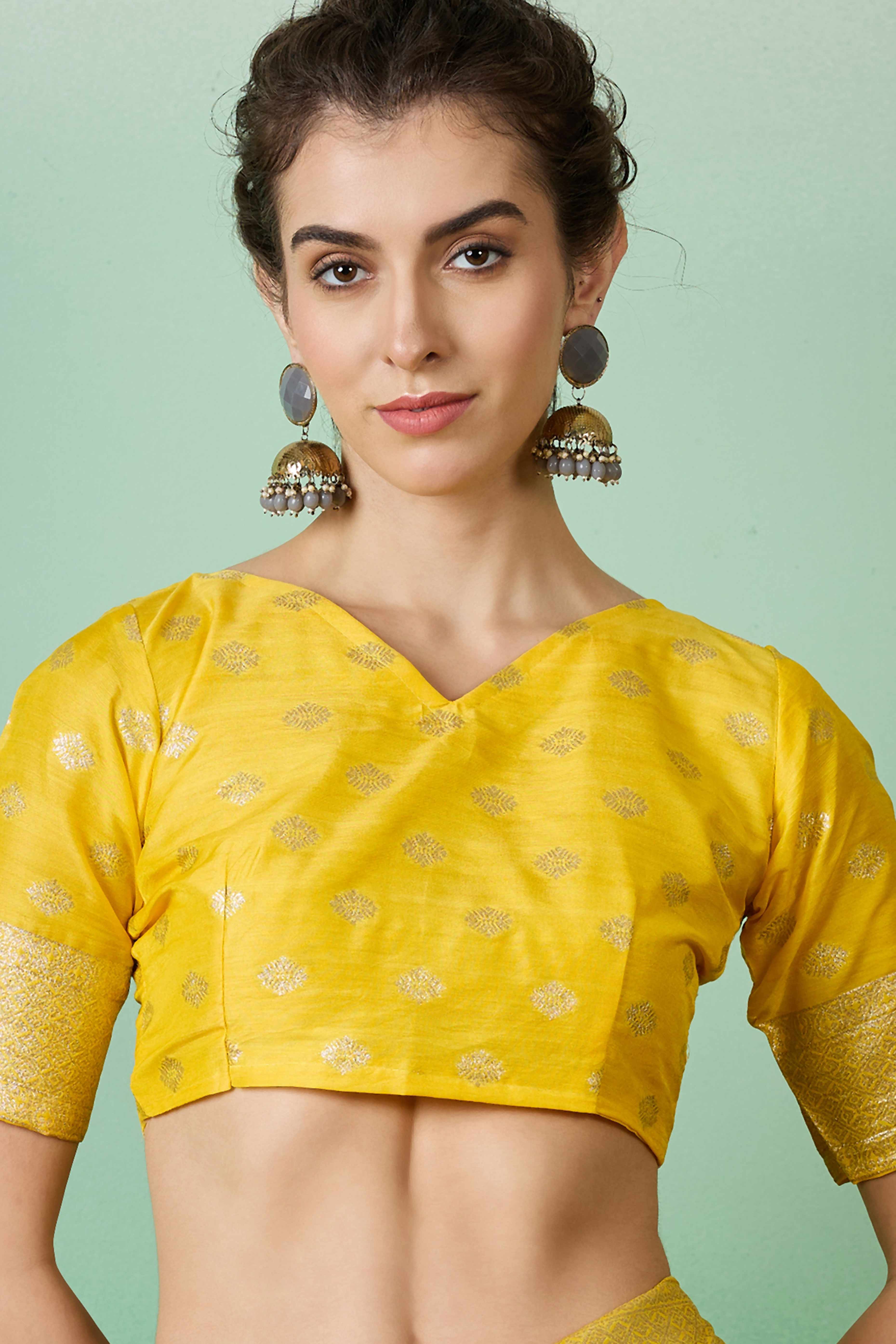 Yellow Zari Woven Staple Cotton Blend Saree With Floral Motifs & Tassel Detailed Pallu