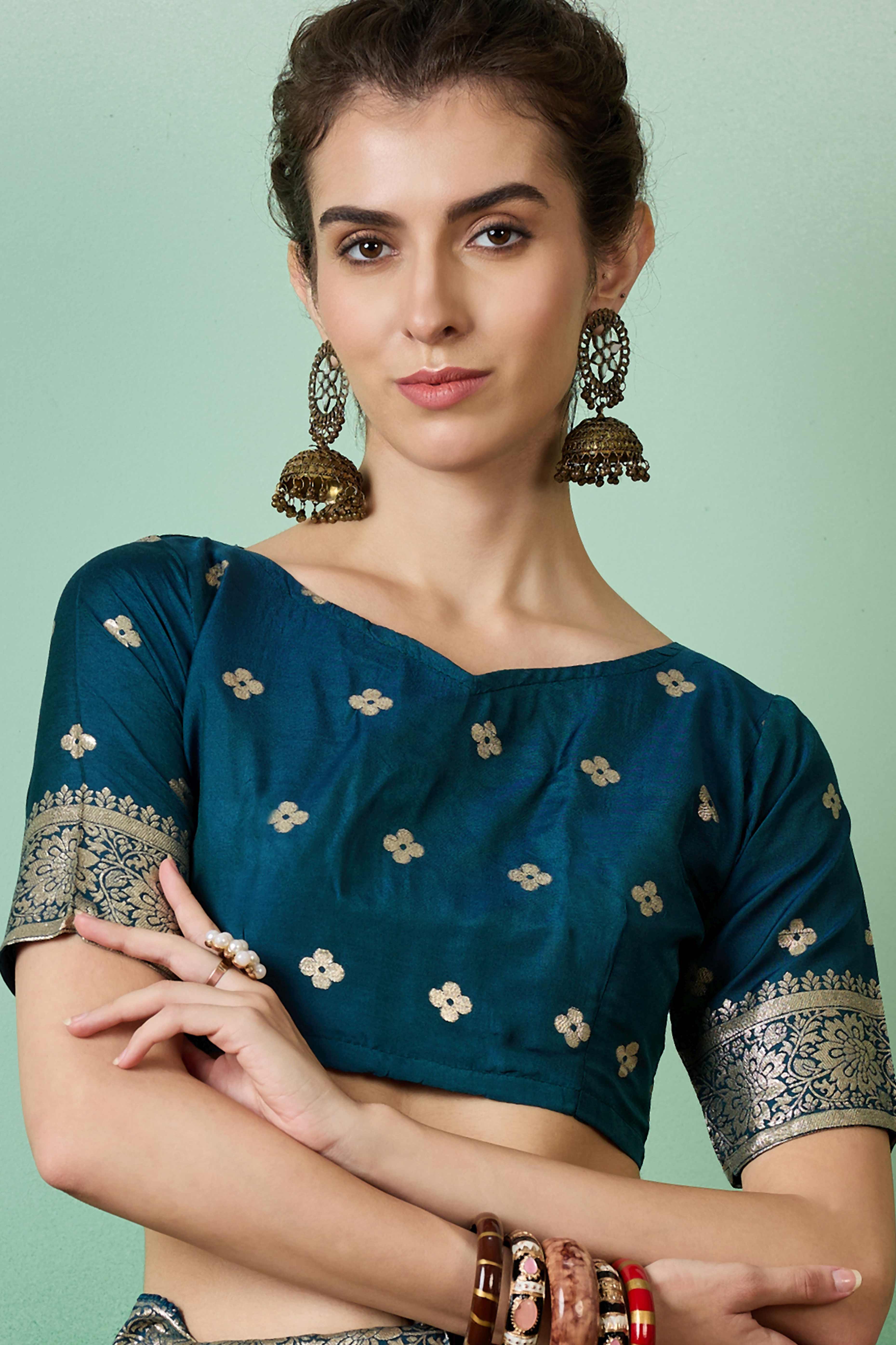 Rich Teal Blue Cotton Blend Jacquard Saree Adorned With Floral Weaving & Graceful Tassel Pallu