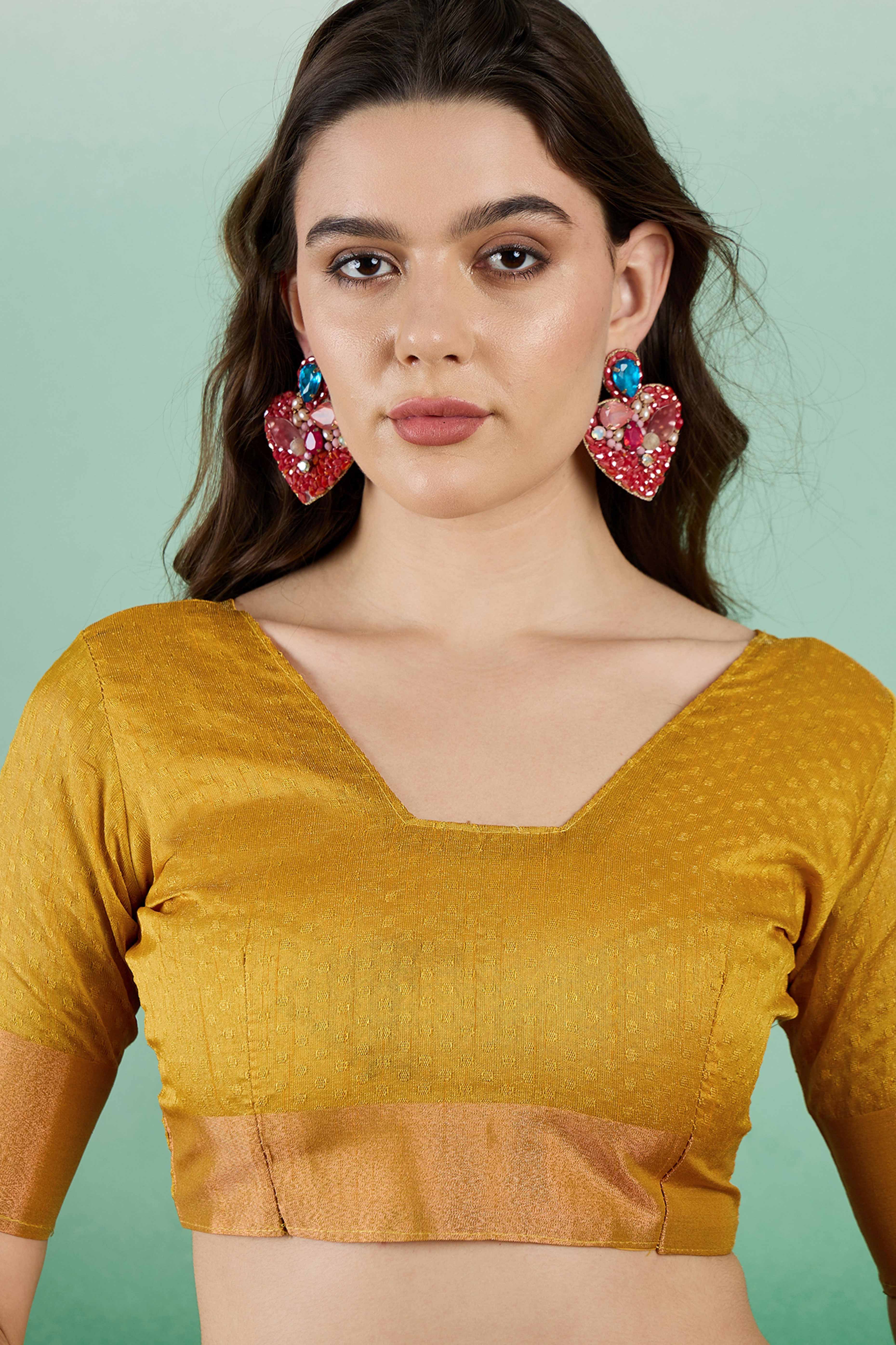 Mustard Khadi Organza Saree Intricate Weaving & Sparkling Sequins with Tassel Pallu