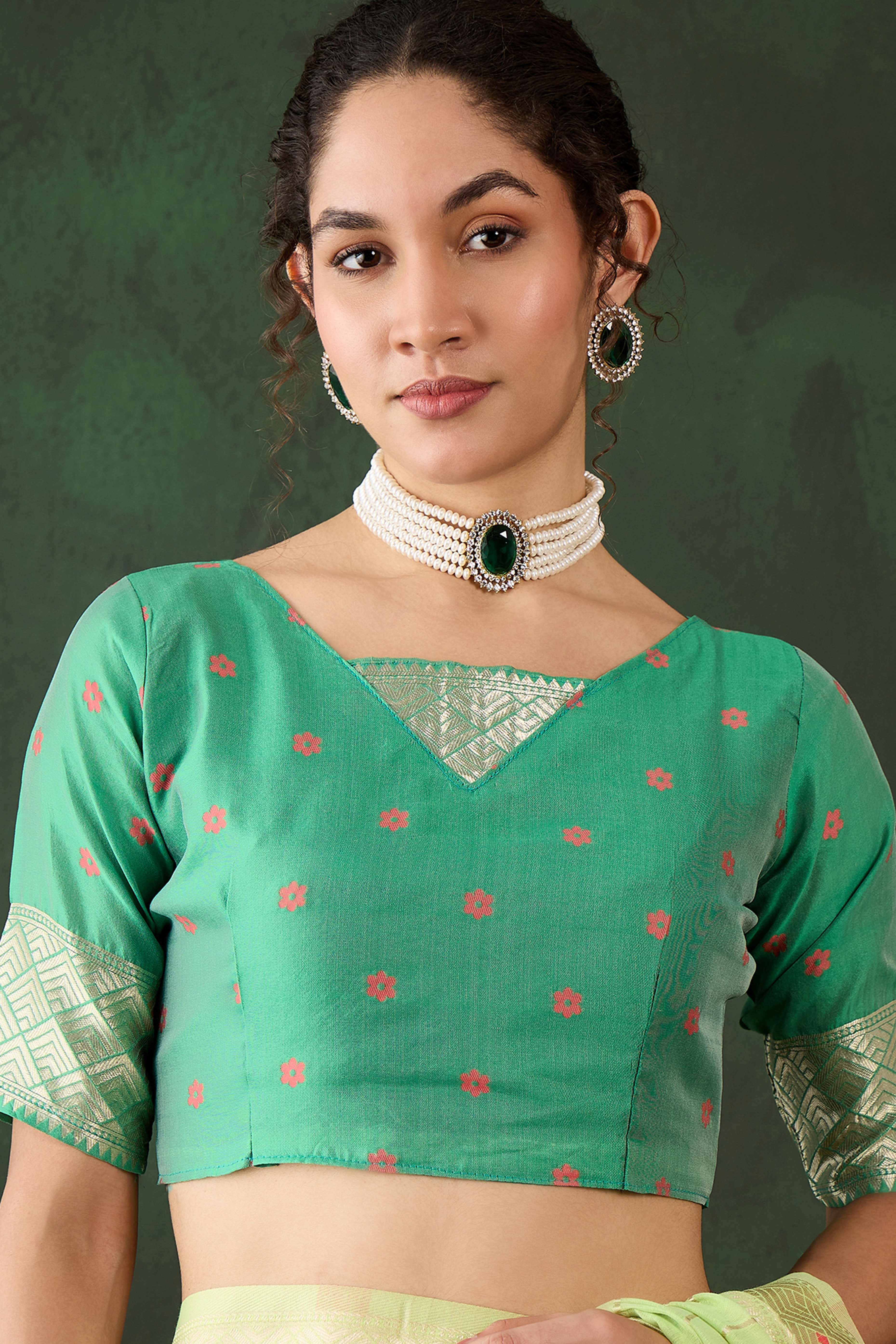 Green Cotton Blend Saree Adorned With Intricate Floral Zari Weaving & A Stylish Tassel Pallu