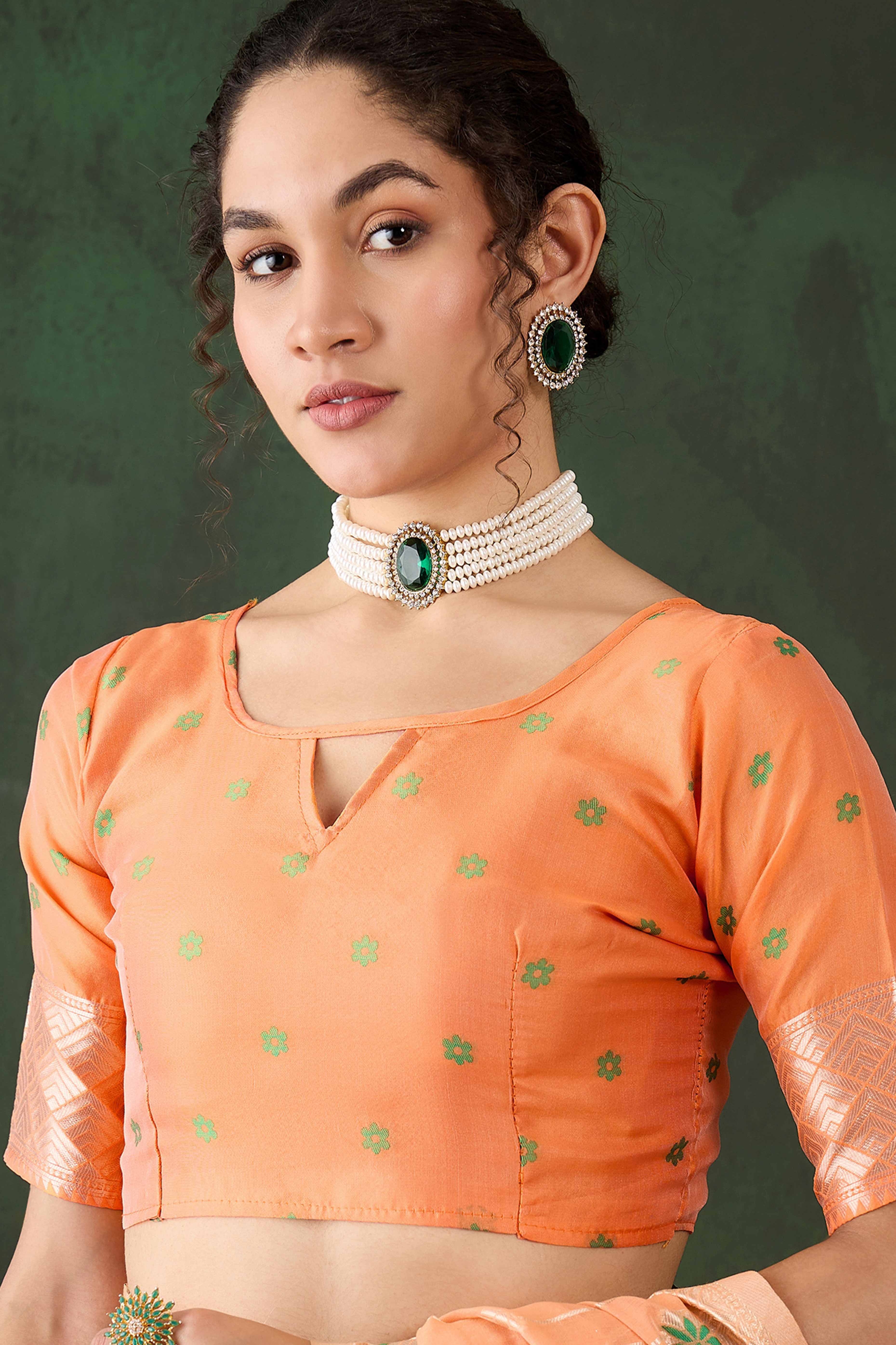 Orange Cotton Blend Saree Adorned With Intricate Floral Zari Weaving & A Stylish Tassel Pallu