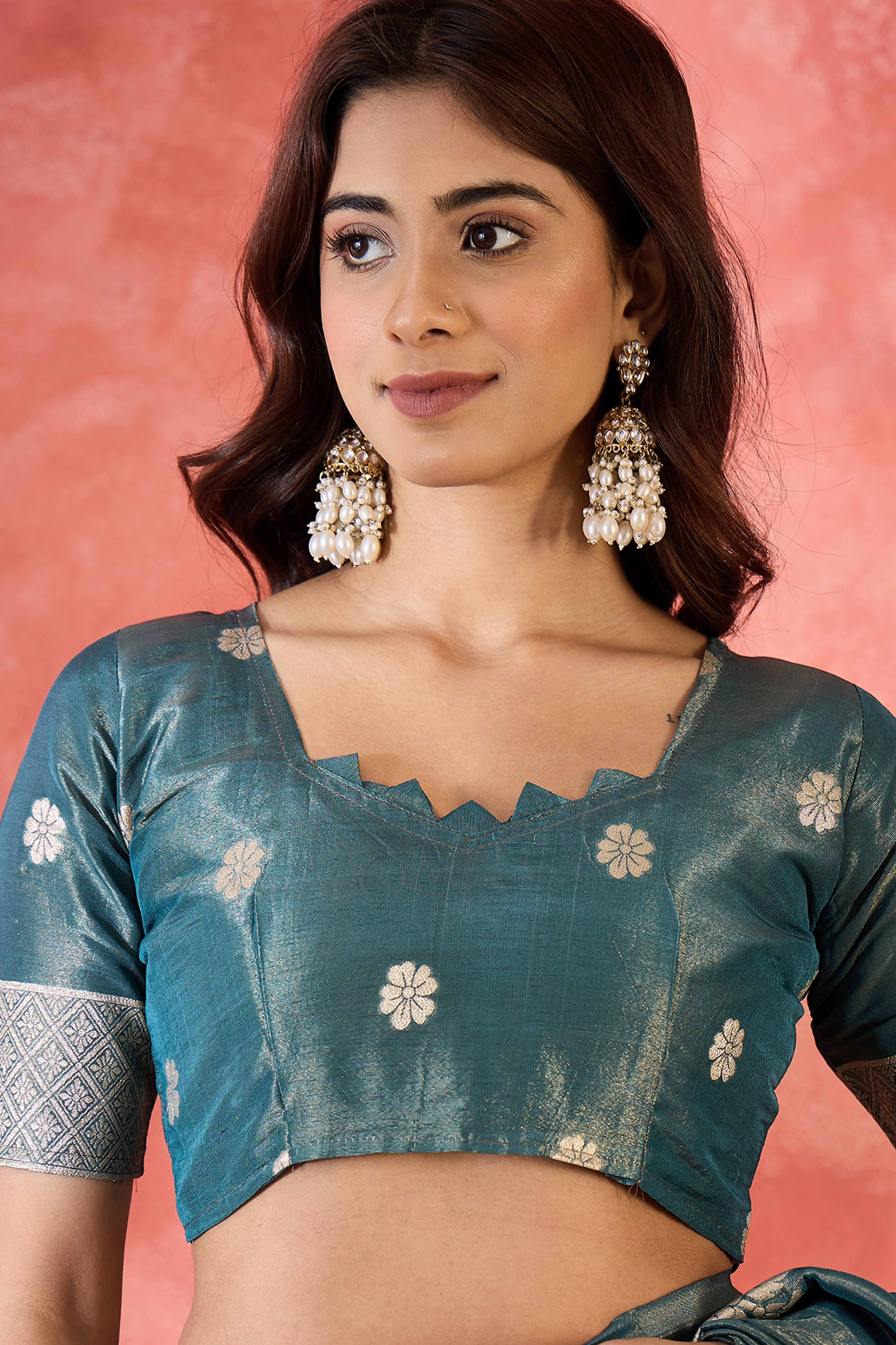 Teal Blue Saree In Shimmer Fabric With Floral Zari Weaving & Decorative Tassel Pallu