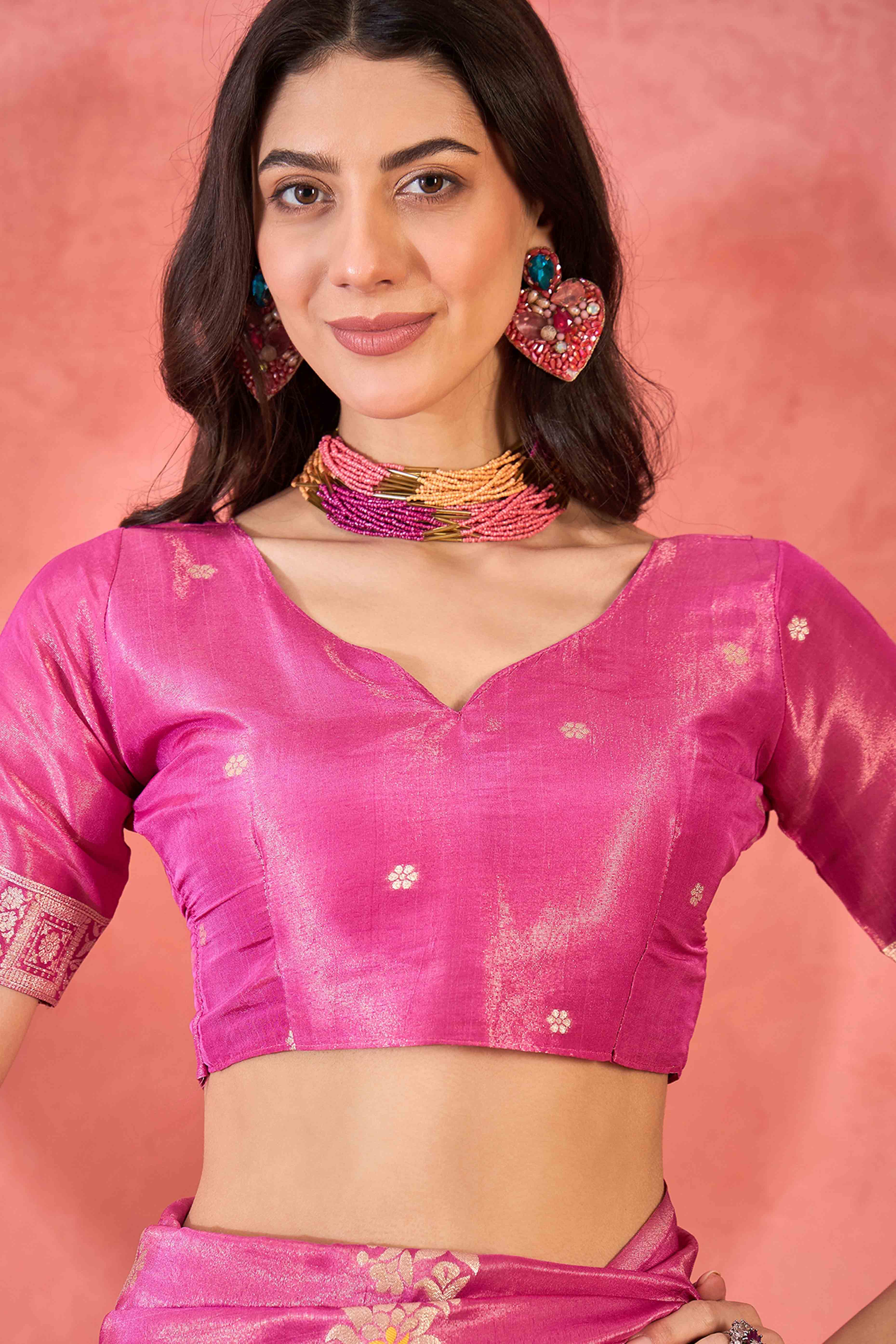 Pink Shimmer Saree Showcasing Floral Zari Weaving & A Tasselled Pallu