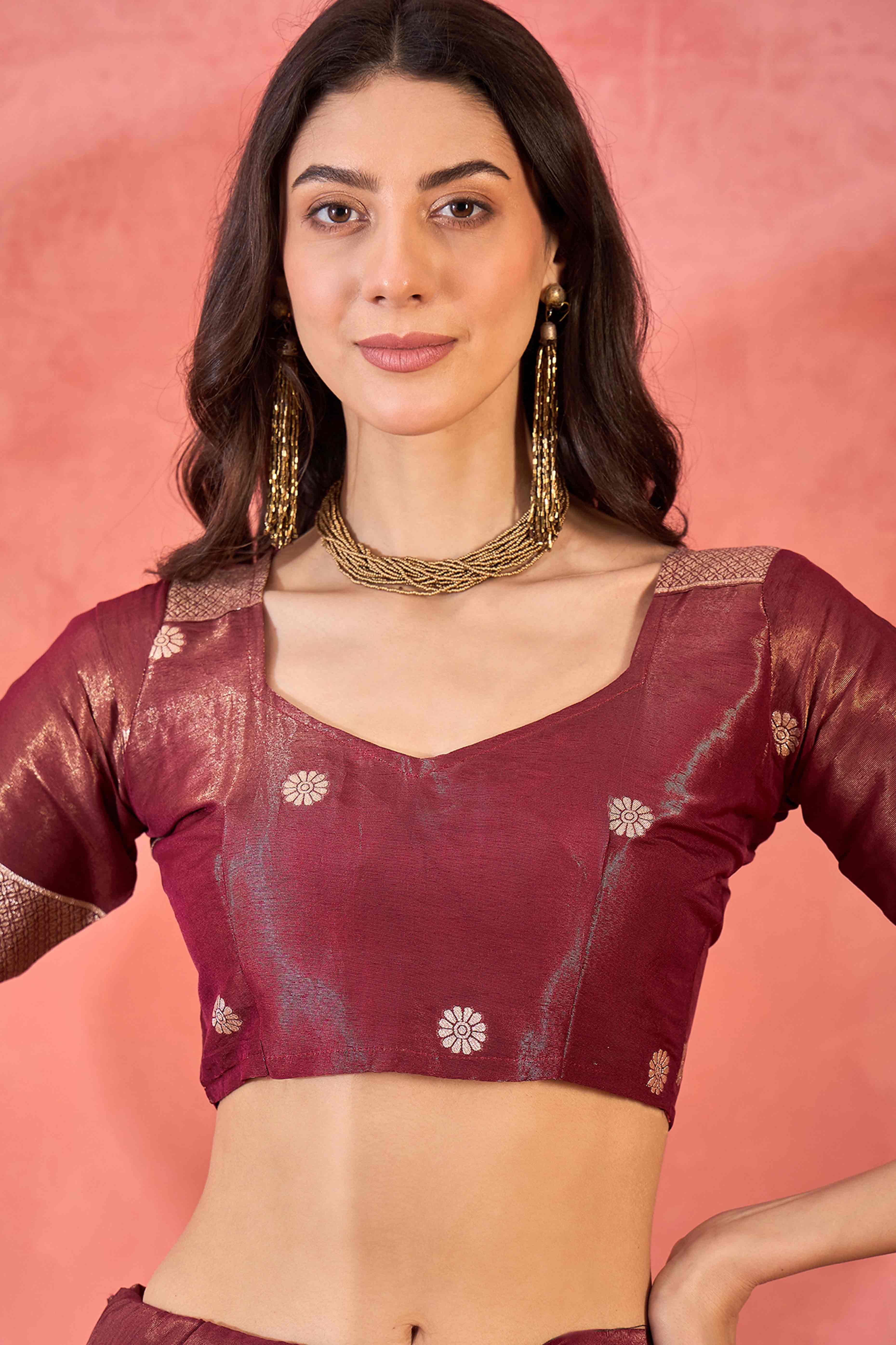 Maroon Shimmer Saree Adorned with Floral Zari Weaving & Tassel Pallu