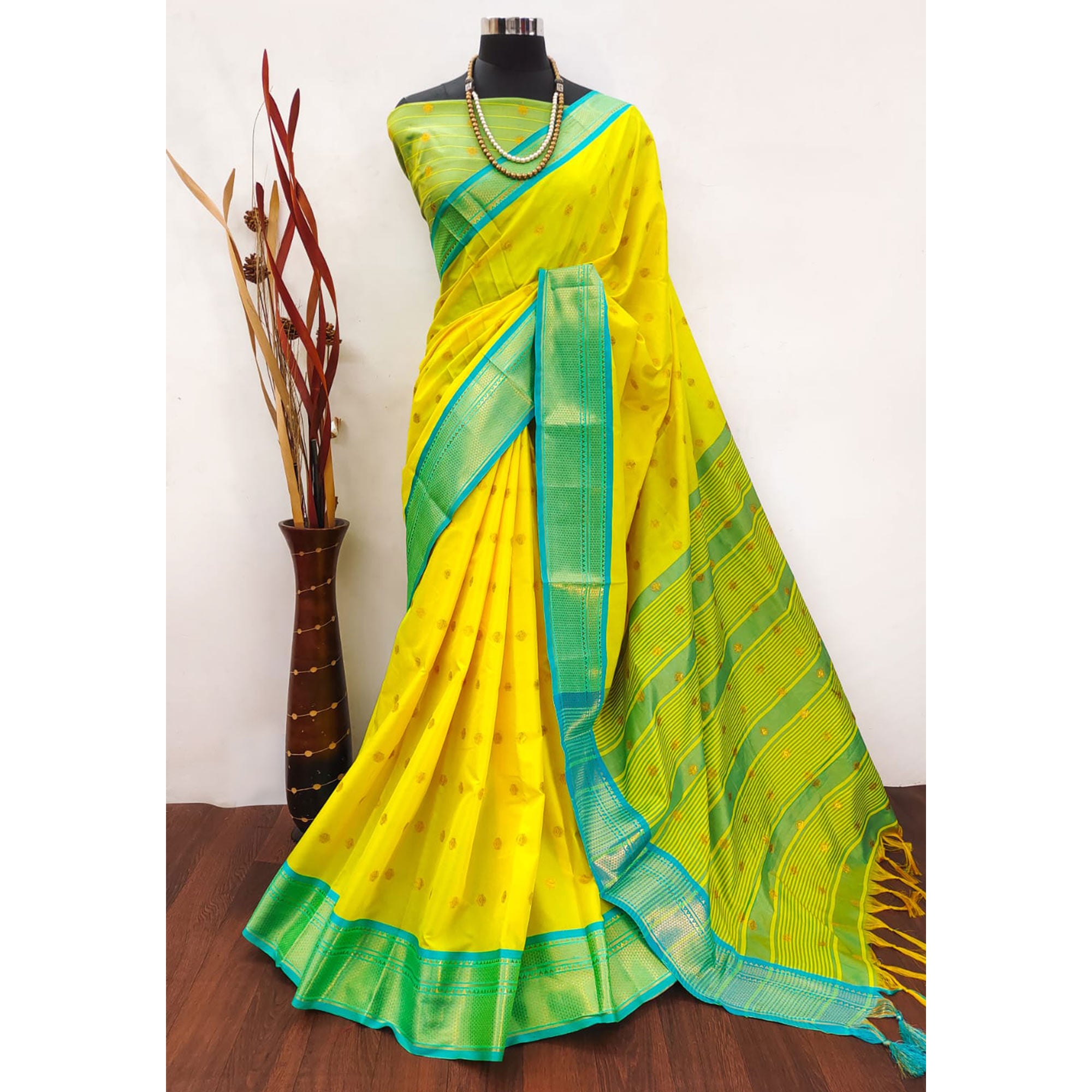 Lemon Yellow Zari Woven Lichi Art Silk Saree With Tassels