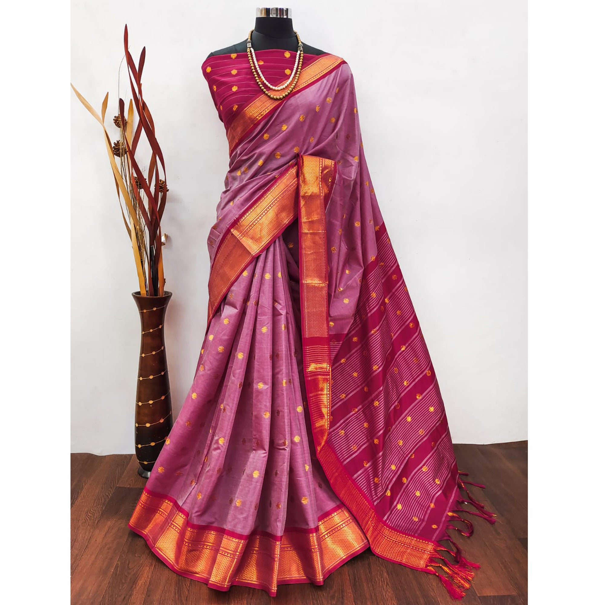 Pink Zari Woven Lichi Art Silk Saree With Tassels