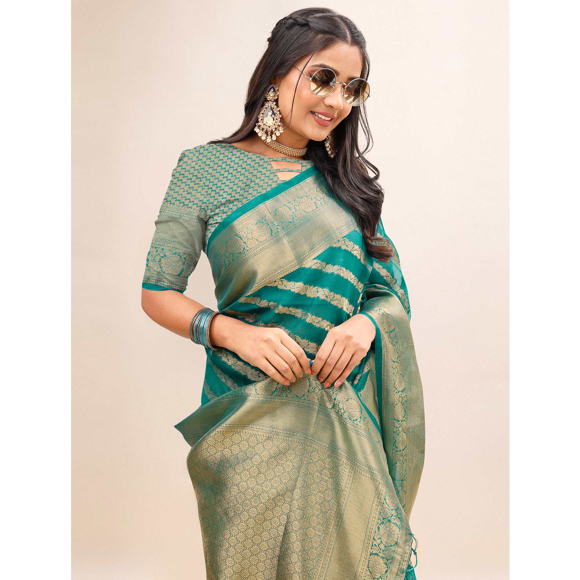 Rama Green Woven Organza Saree With Tassels