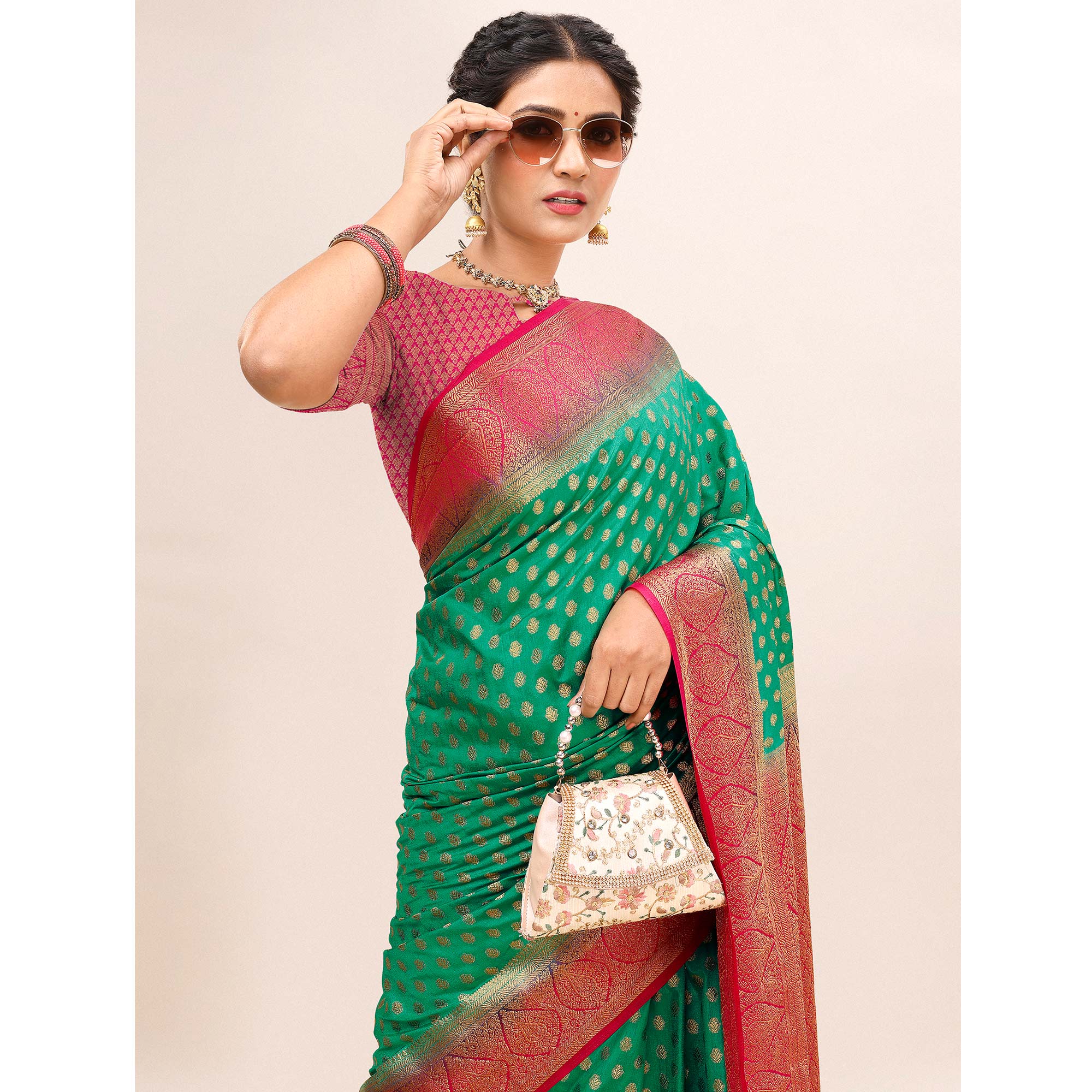 Green Woven Dola Silk Saree With Tassels