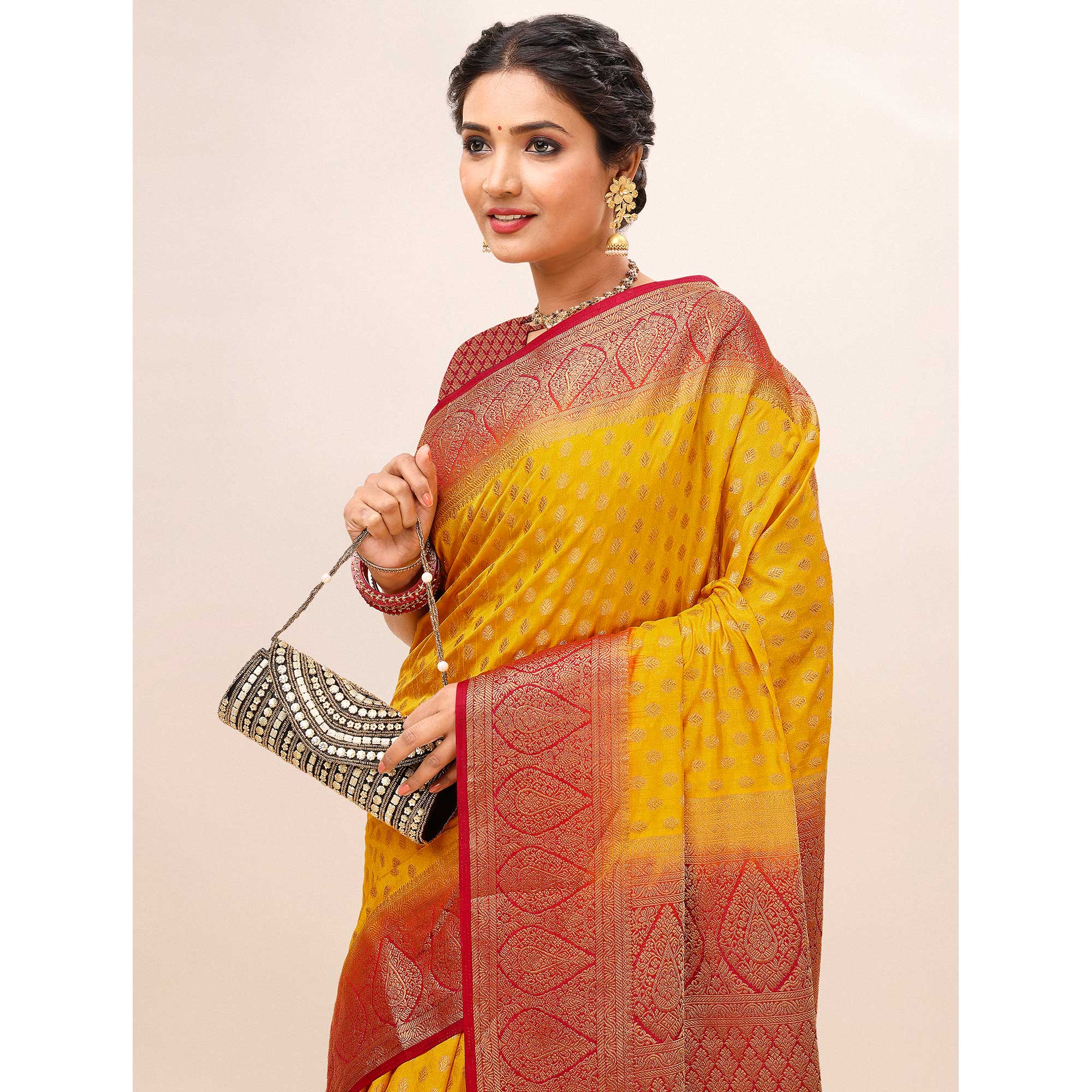 Yellow Woven Dola Silk Saree With Tassels