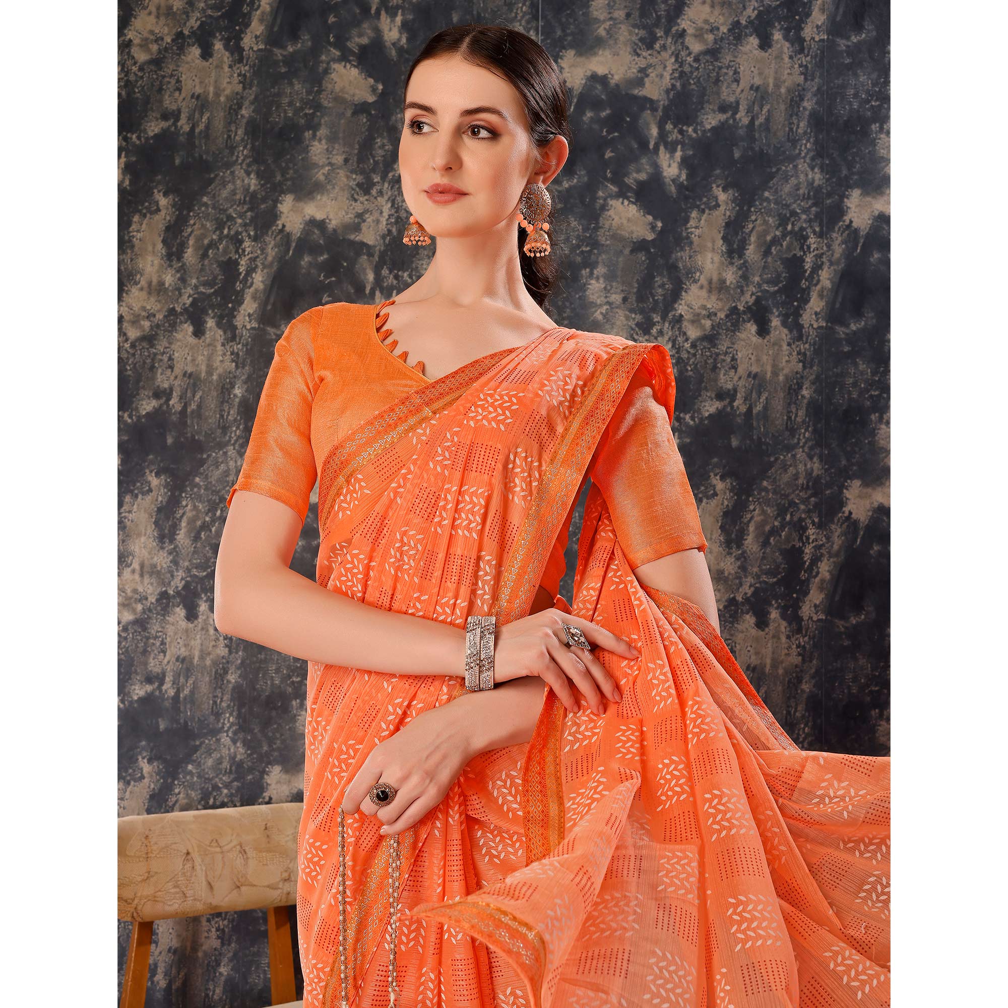 Light Orange Printed Chiffon Saree With Lace Border