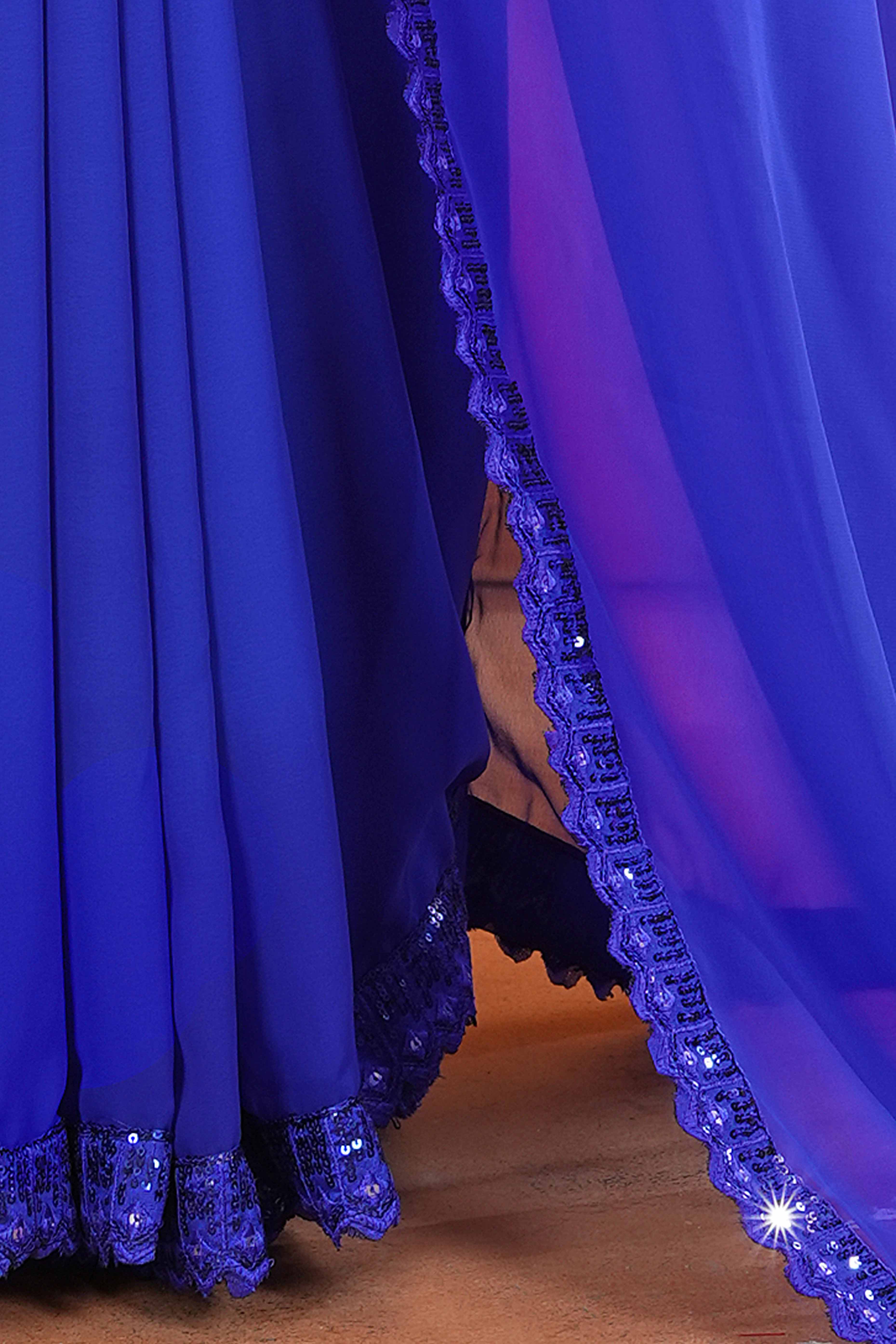 Blue Georgette Saree with Subtle Solid Pattern and Sequins Border
