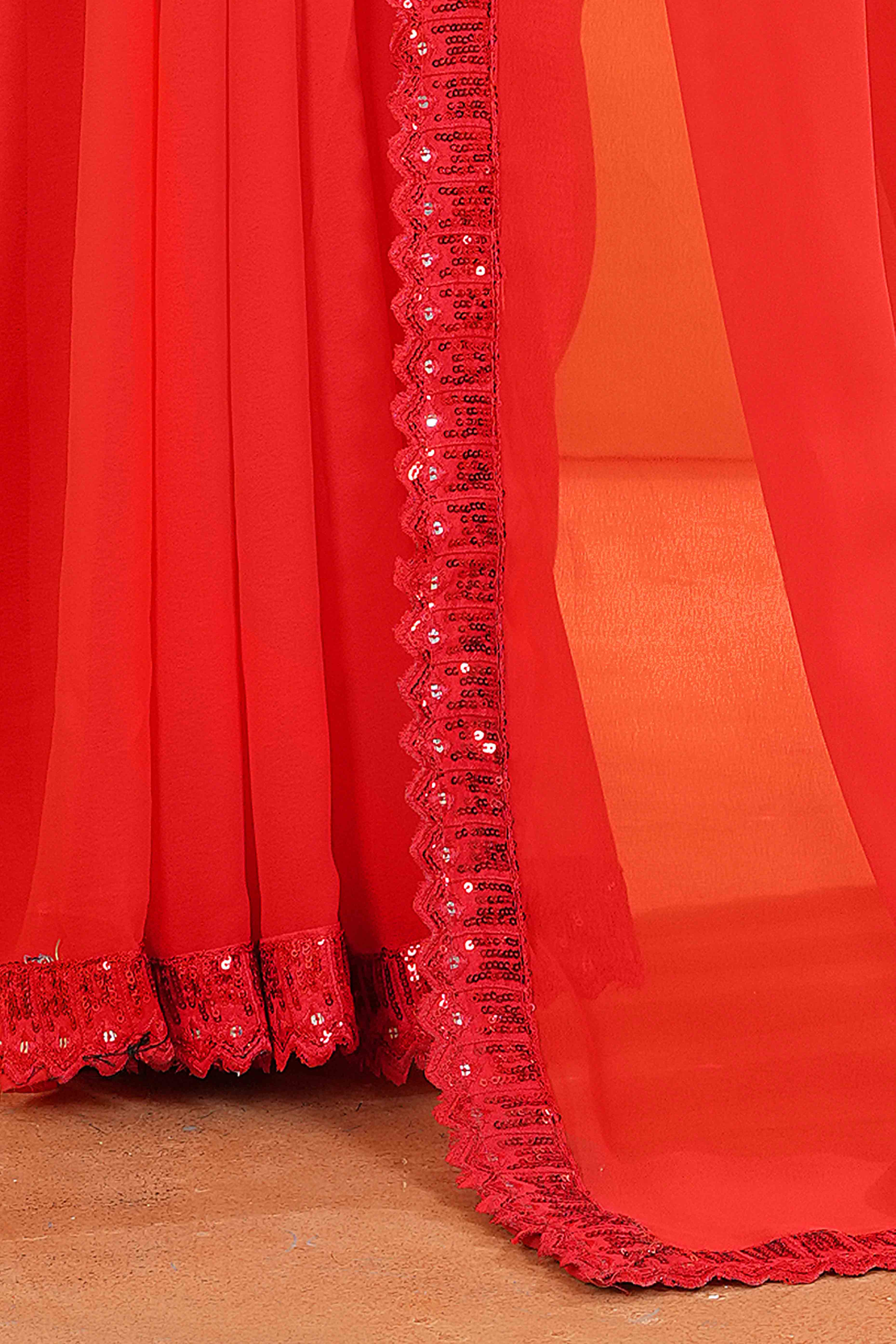 Red Georgette Saree with Subtle Solid Pattern and Sequins Border