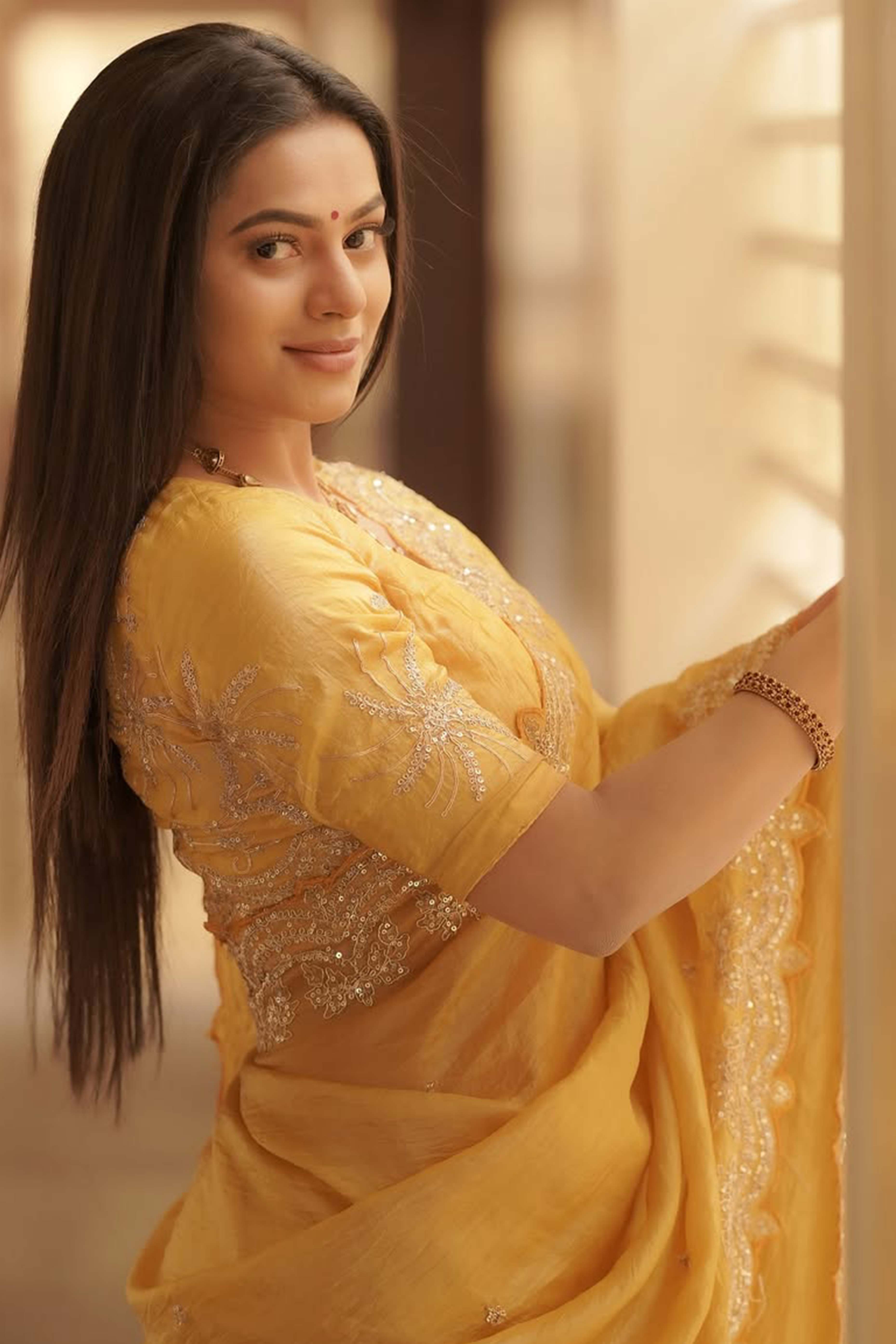 Golden Silk Blend Saree Accented with Sparkling Sequin Embellished