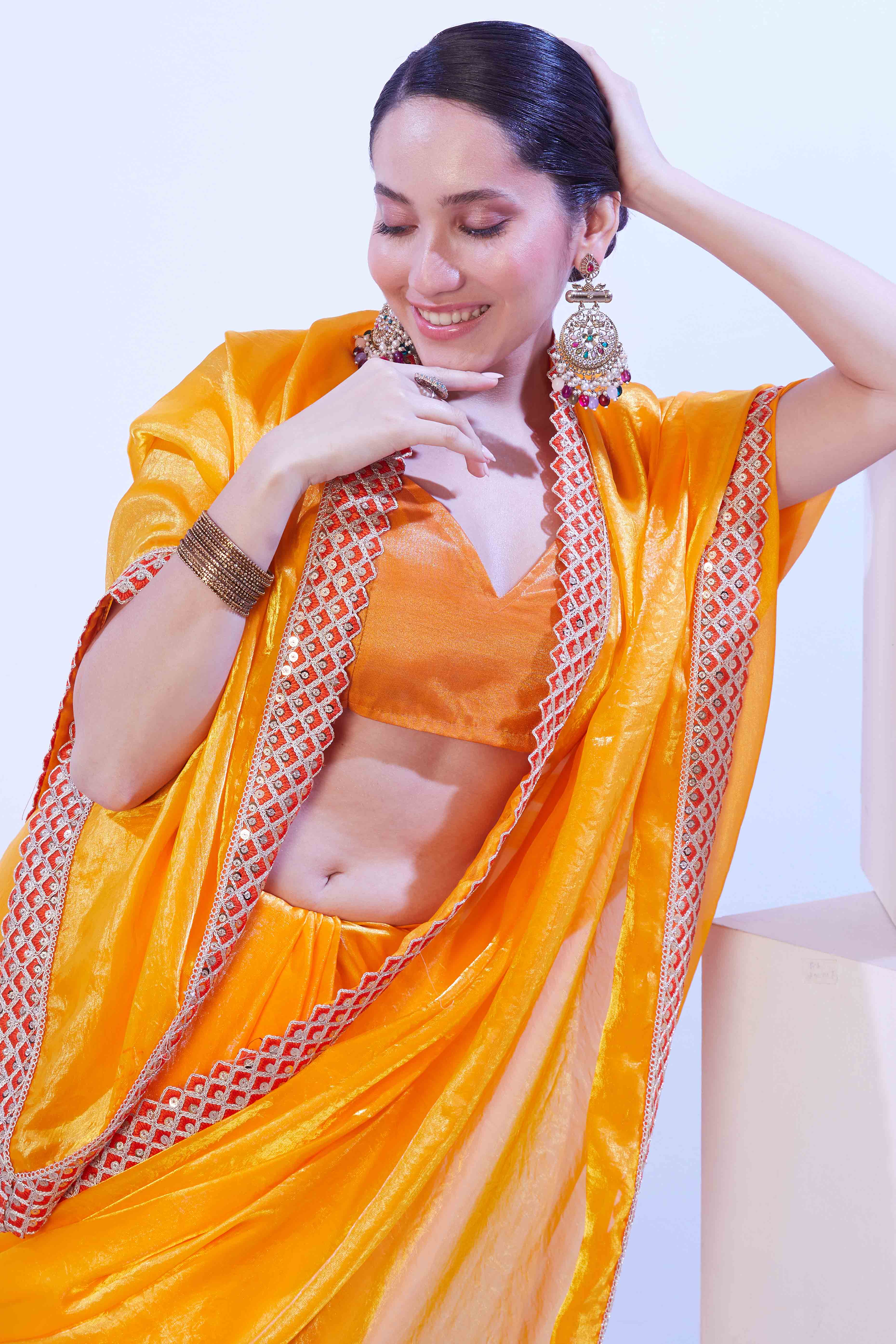 Bright Orange Satin Solid Embroidered Saree Adorned with Beads & Stones