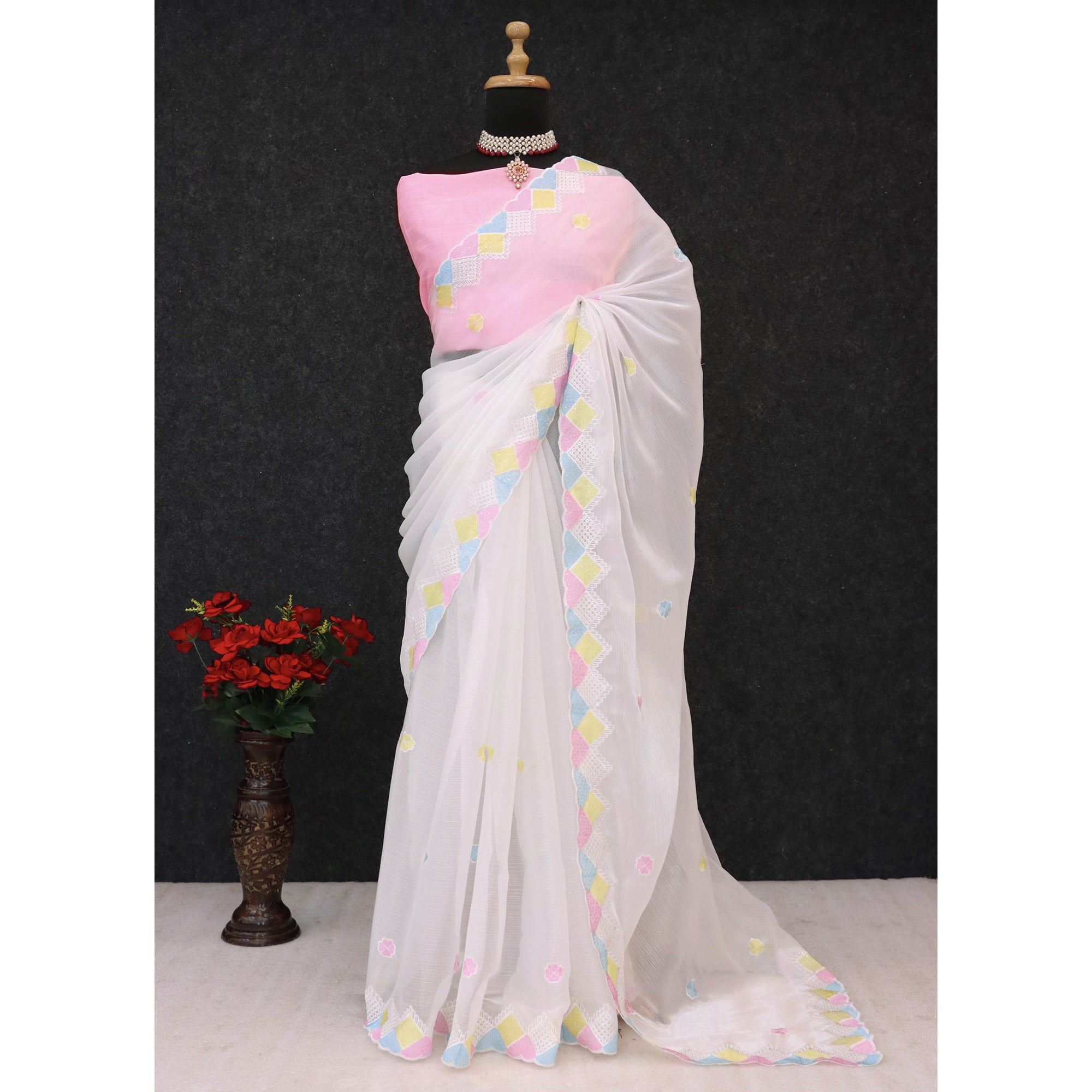 Graceful White Chiffon Silk Saree Adorned With Delicate Floral Sequin Work
