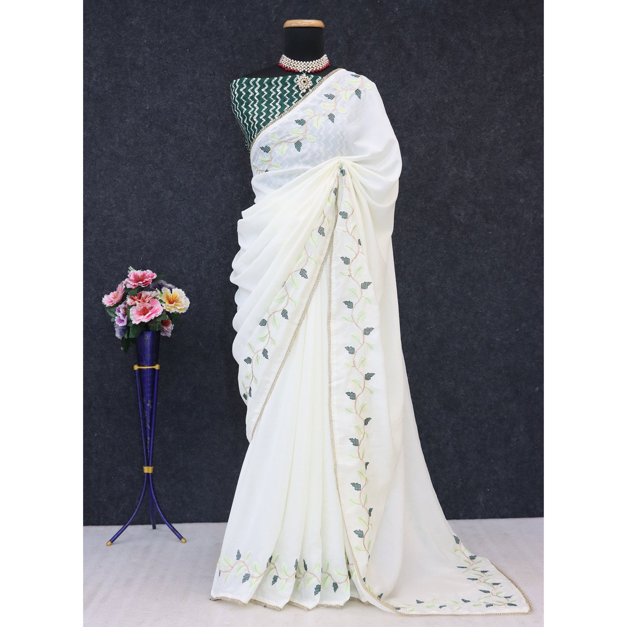 Elegant Offwhite & Green Pure Silk Saree With Intricate Thread Embroidery And Delicate Lace Border