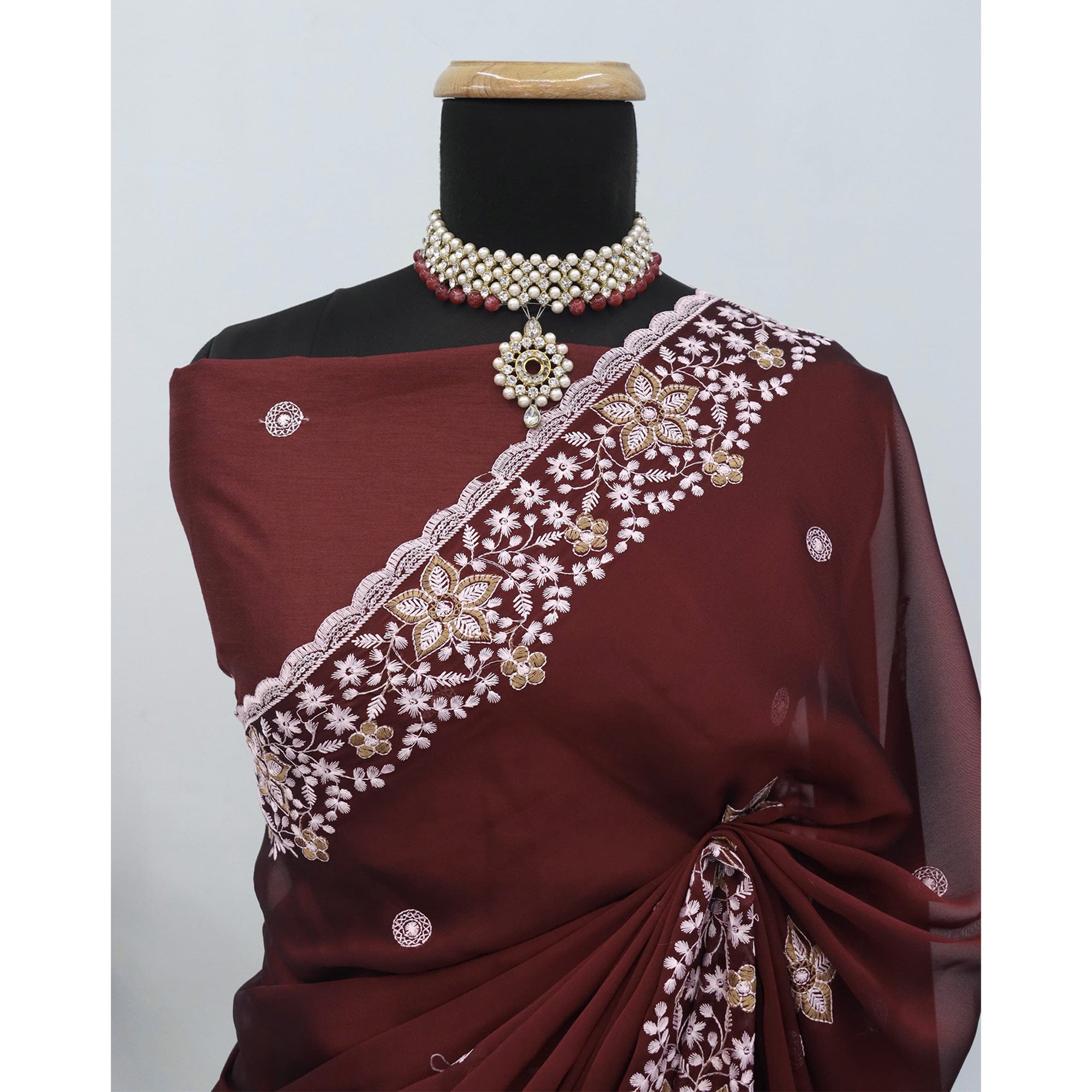 Maroon Designer Art Silk Saree Enhanced with Fine Floral Embroidery Work
