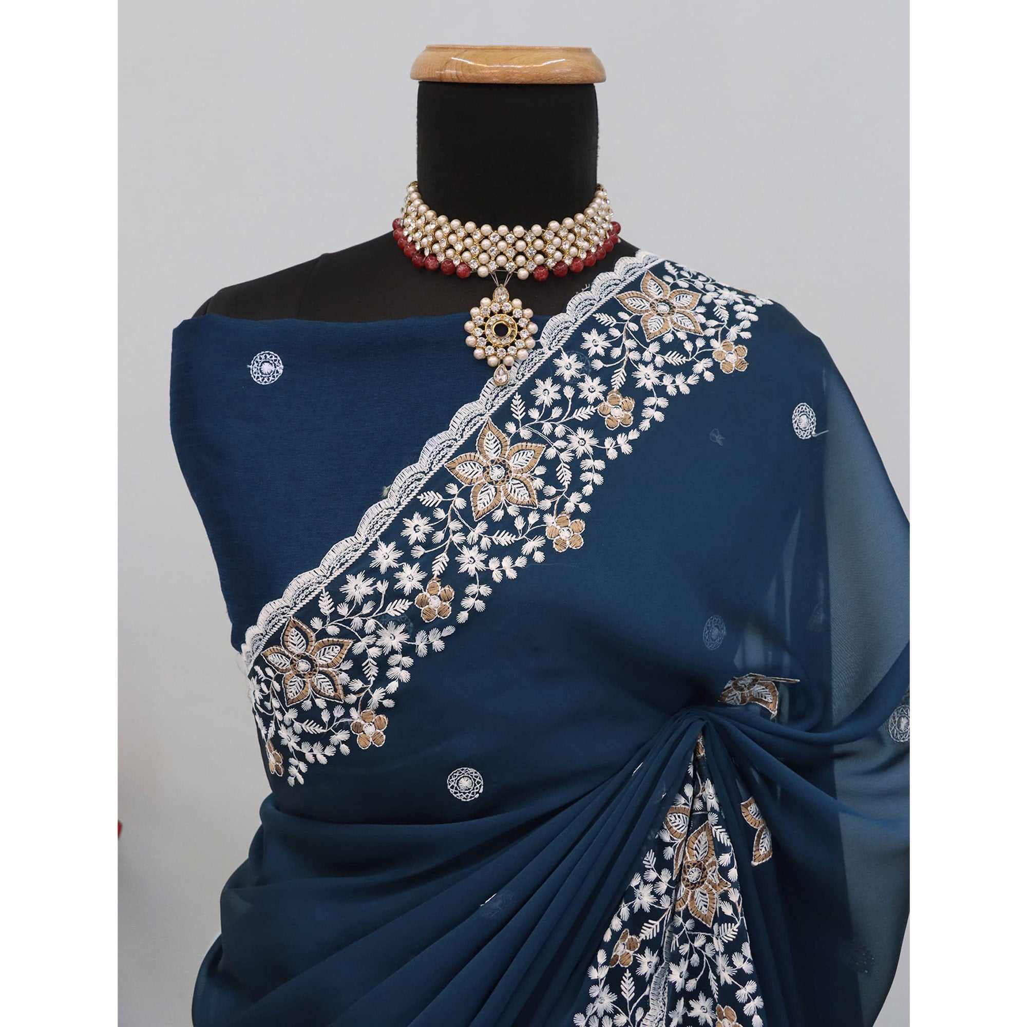 Teal Designer Art Silk Saree Enhanced with Fine Floral Embroidery Work